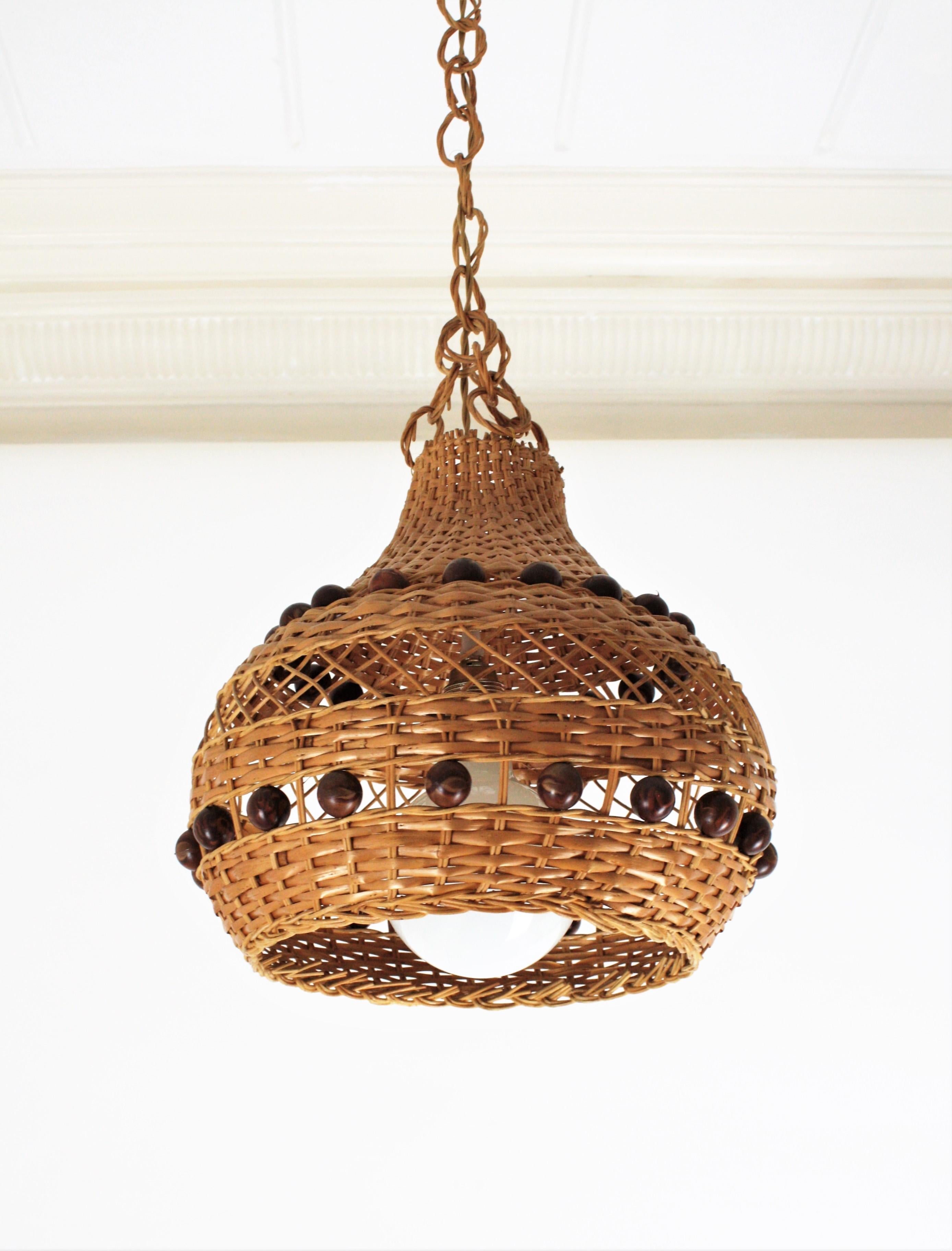 Wicker Spanish Rattan Pendant Light / Lantern with Balls Accents For Sale