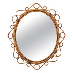 Miroir ovale espagnol en bambou et rotin, années 1960
