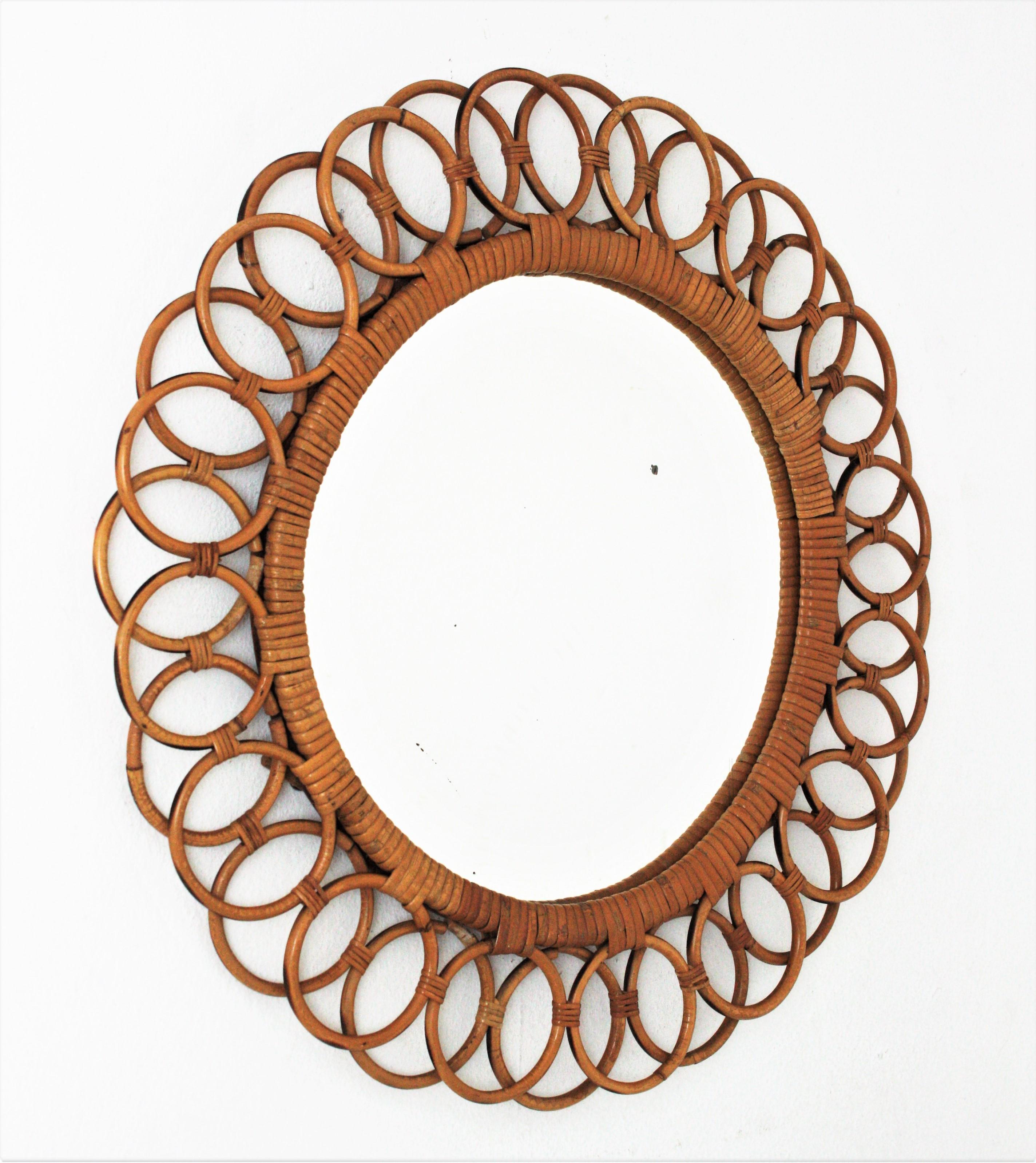 Mid-Century Modern Spanish Rattan Round Mirror with Rings Frame For Sale