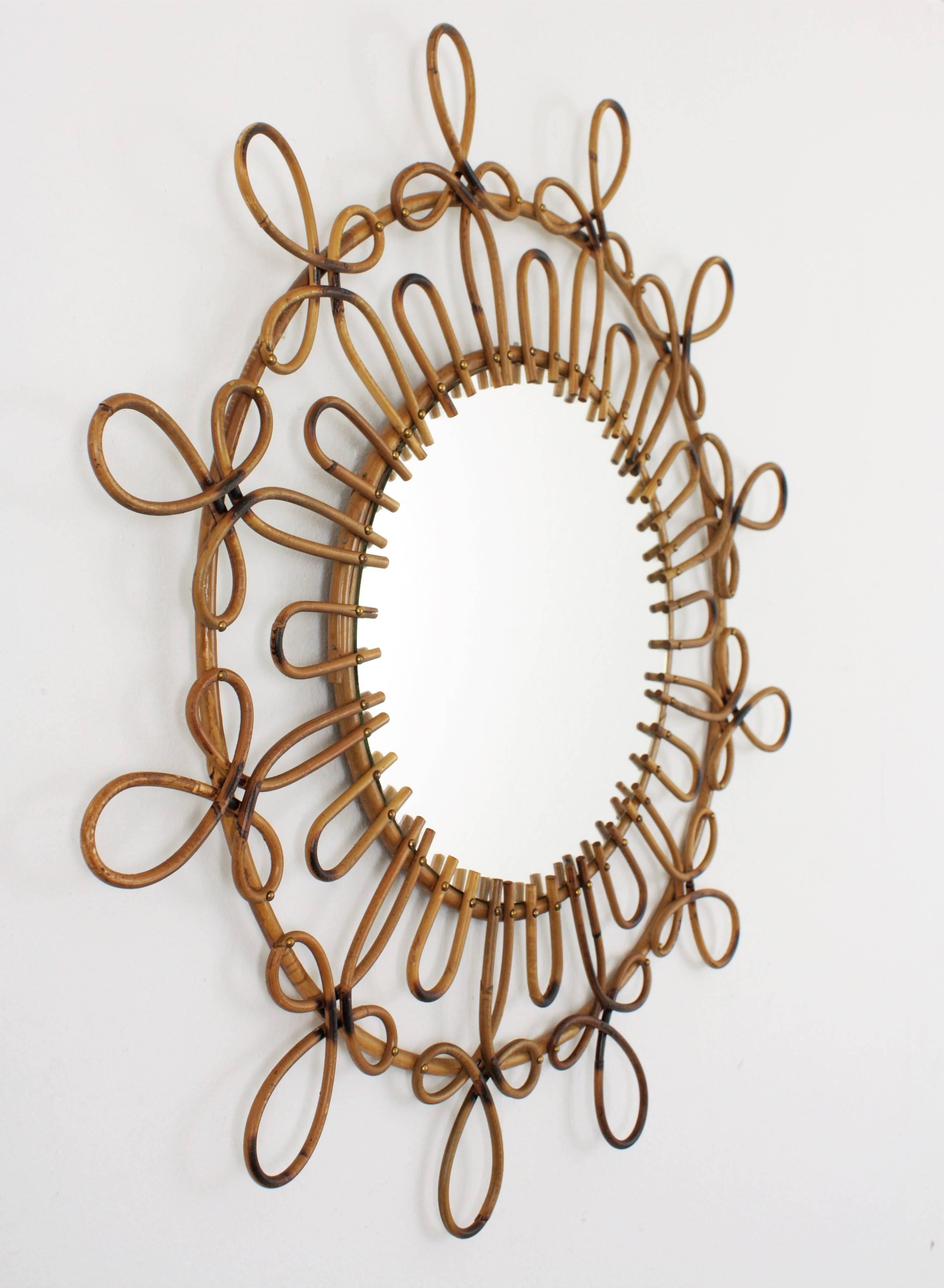 Hand-Crafted Spanish Rattan and Wicker Flower Burst Mirror with Loops and Pyrography Details
