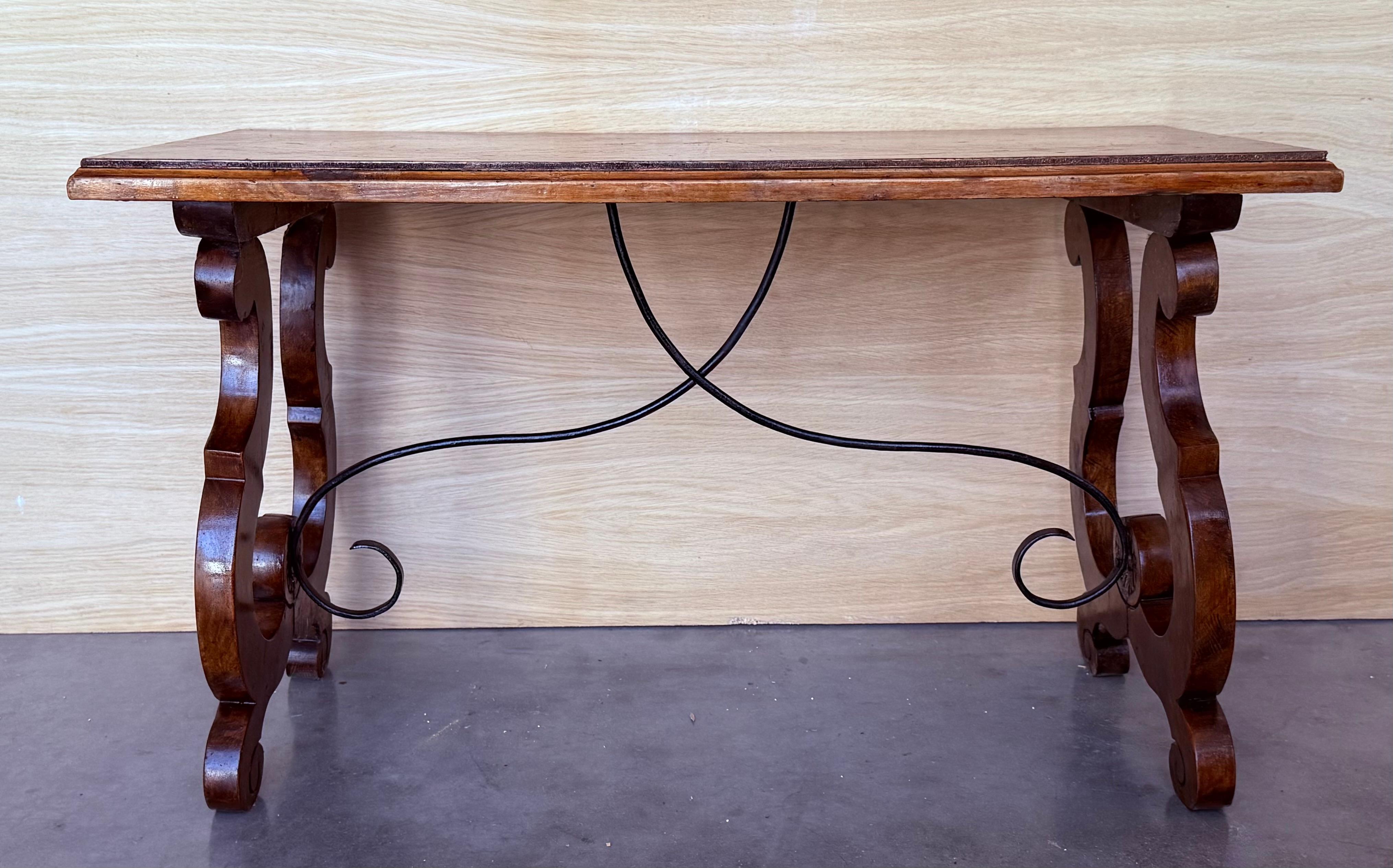 Spanish rectangular coffee table with lyre Legs and iron stretcher