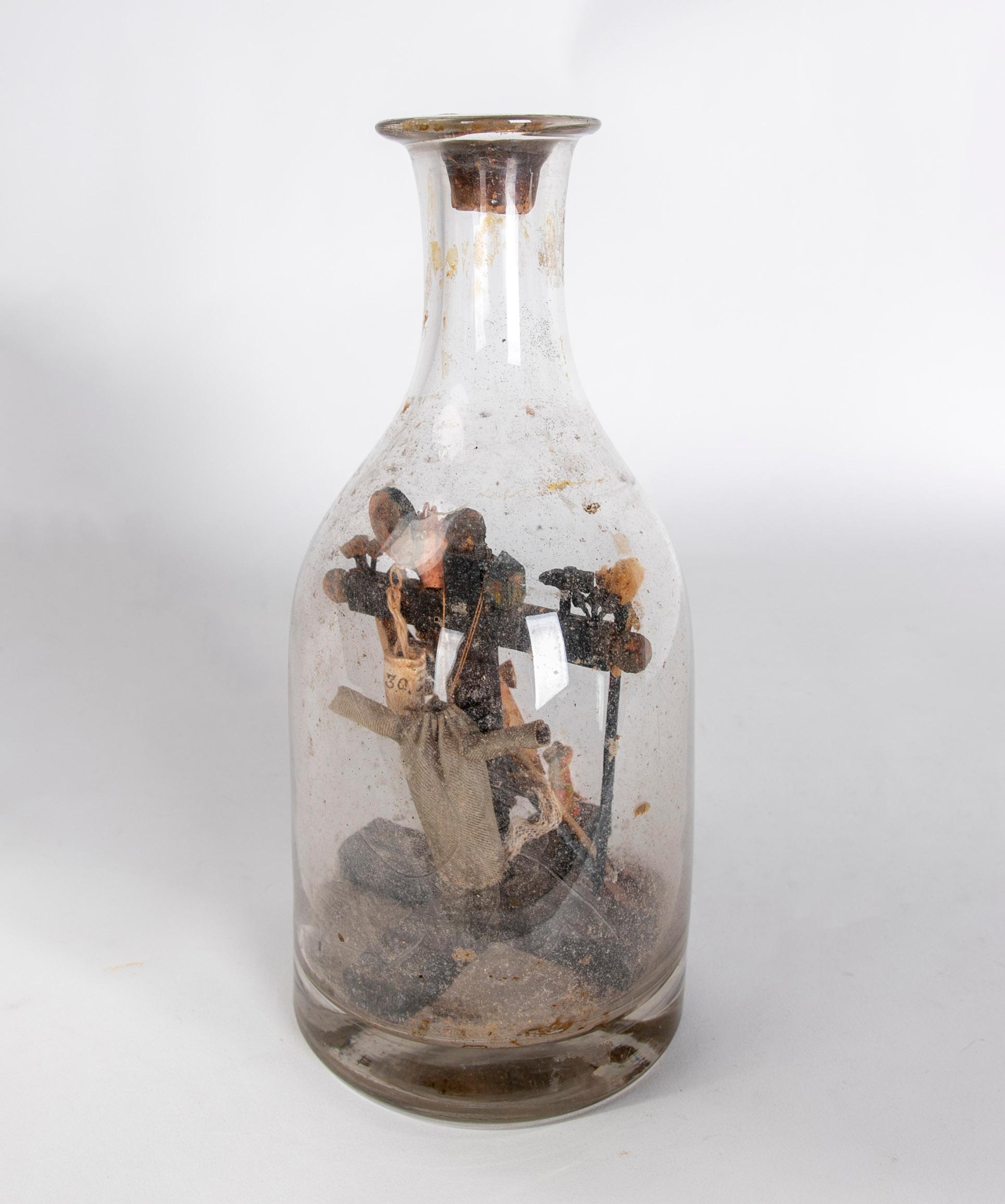 Spanish Reliquary Bottle with Religious Decoration on the Inside.