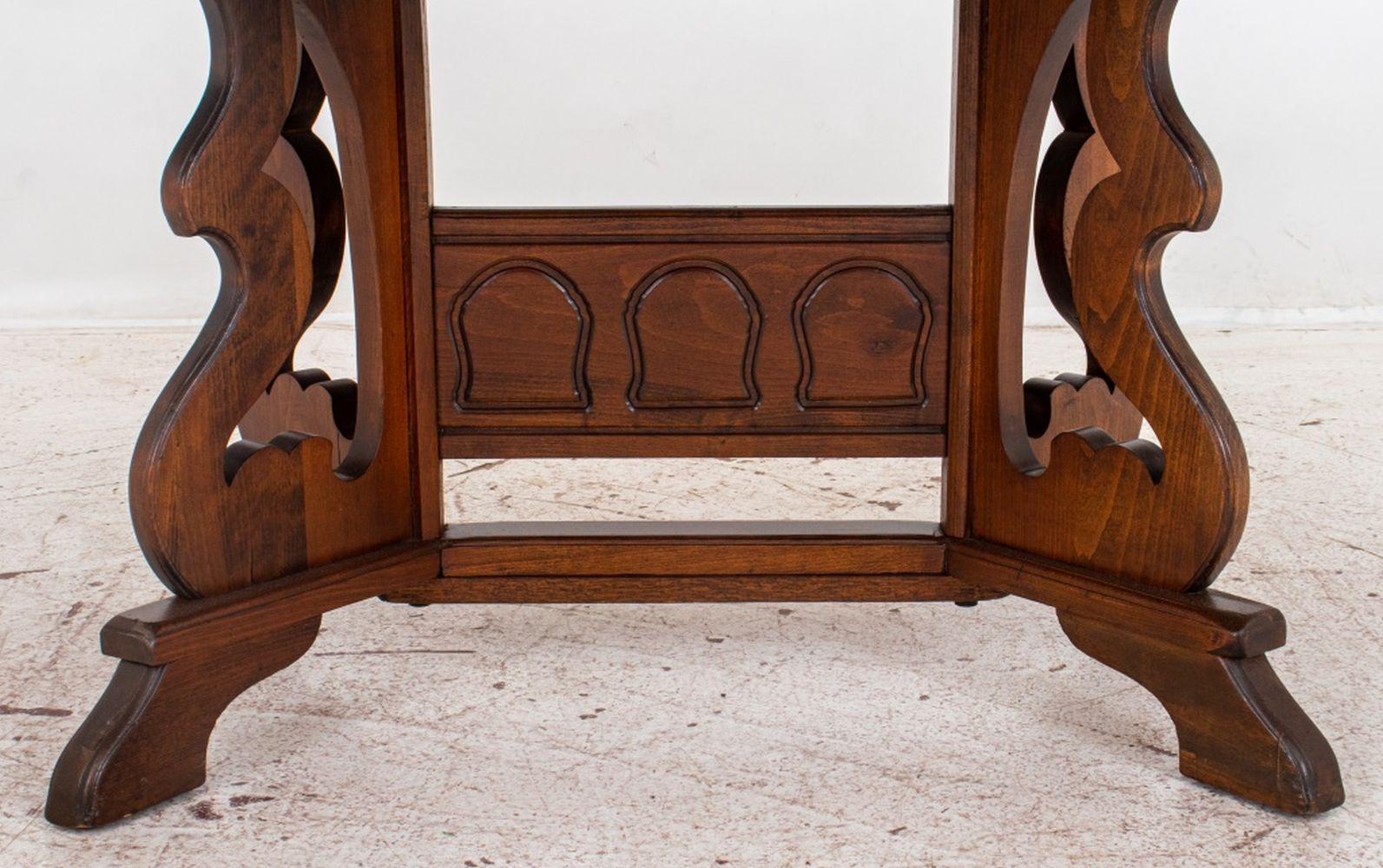 Spanish Renaissance Revival Extendable Oak Oval Dining Table, raised on carved pedestal base, with two leaves. Without leaves: 28.5