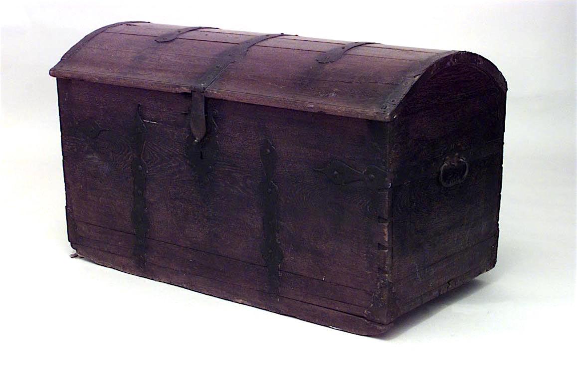 Spanish Renaissance style (17th Cent) large oak camel top floor trunk with wrought iron trim.
