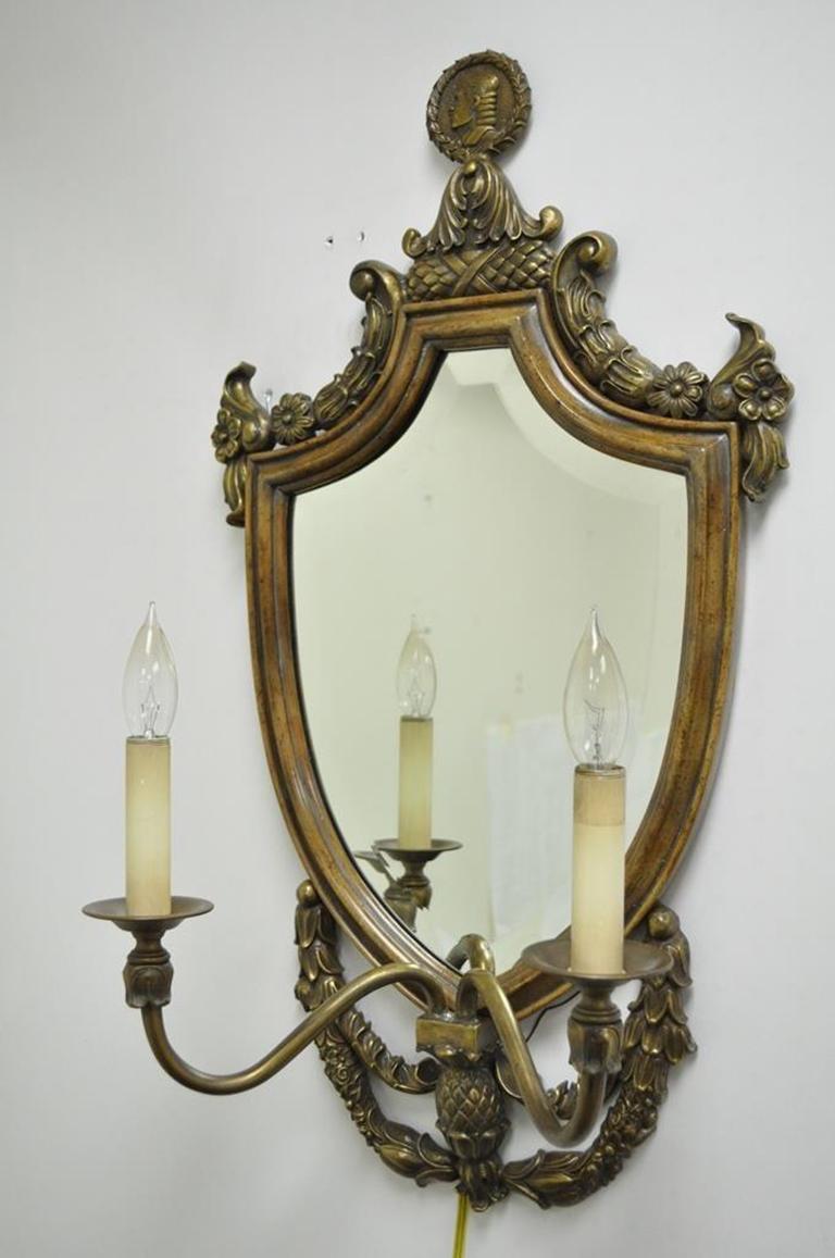 Spanish Renaissance Style Brass Wood Mirror Shield Cameo Electric Sconces, Pair In Good Condition For Sale In Philadelphia, PA