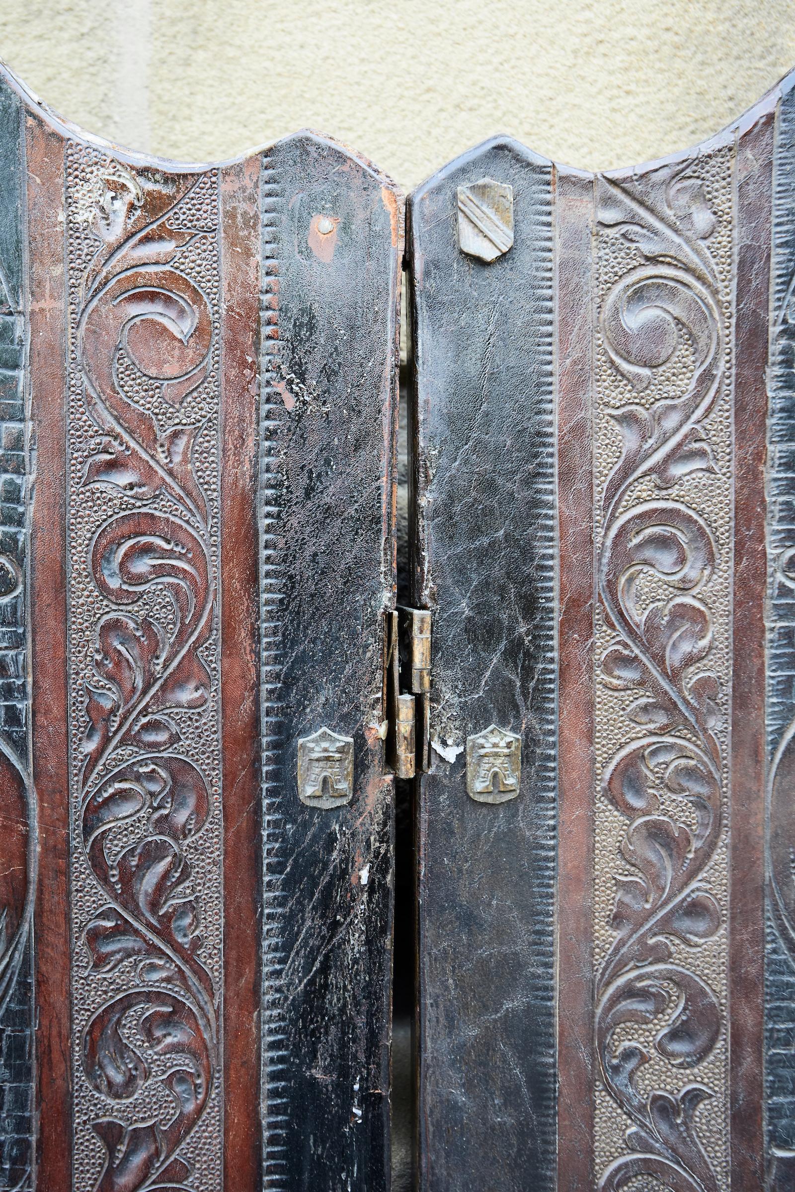 Spanish Renaissance style embossed leather four panels folding screen.