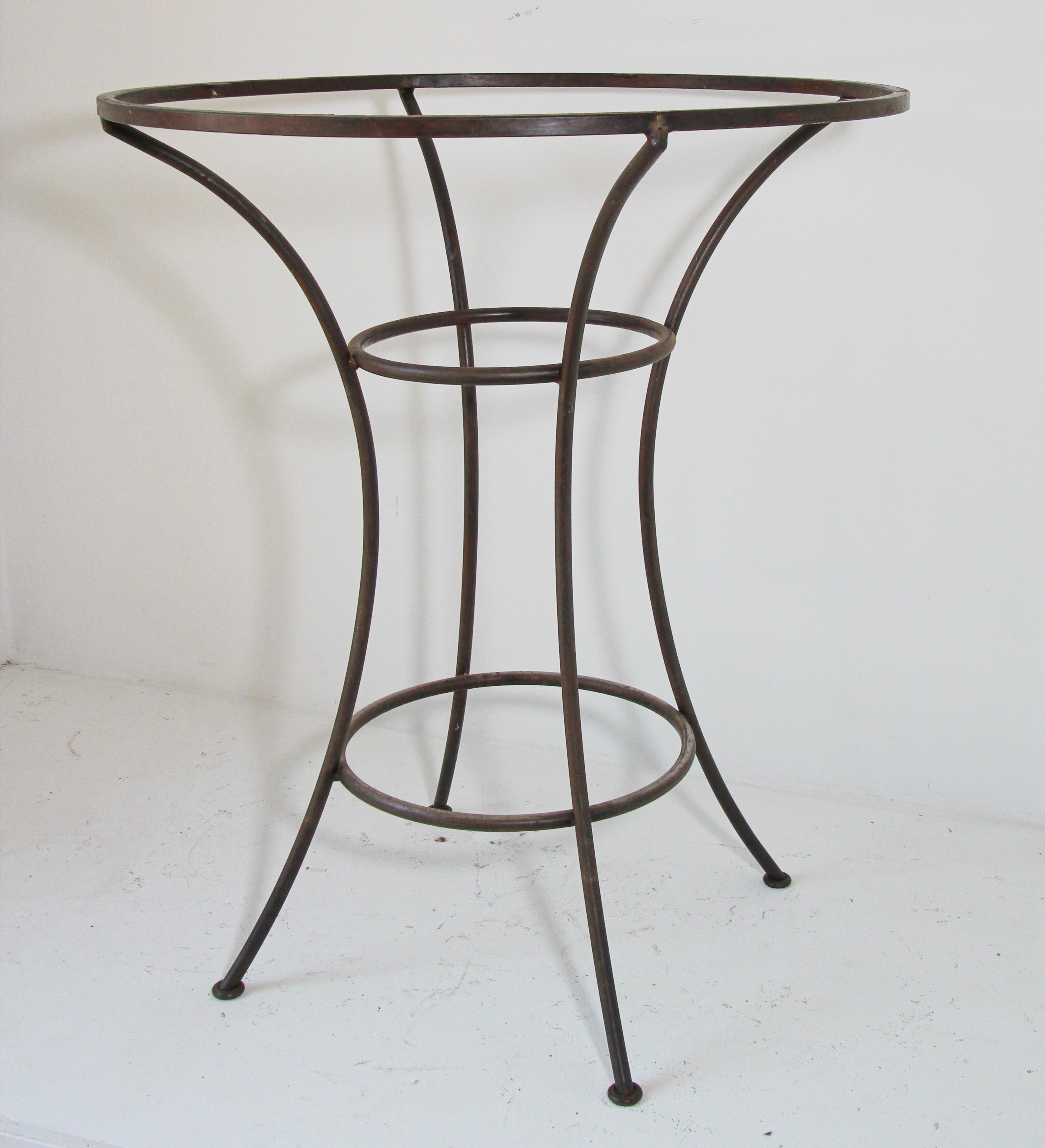 Handcrafted custom bar height table with wrought iron forged base.
Spanish Revival bar table with simple four curved legs. 
Dimensions:
Iron forged table base: Diameter 36 x Height 42