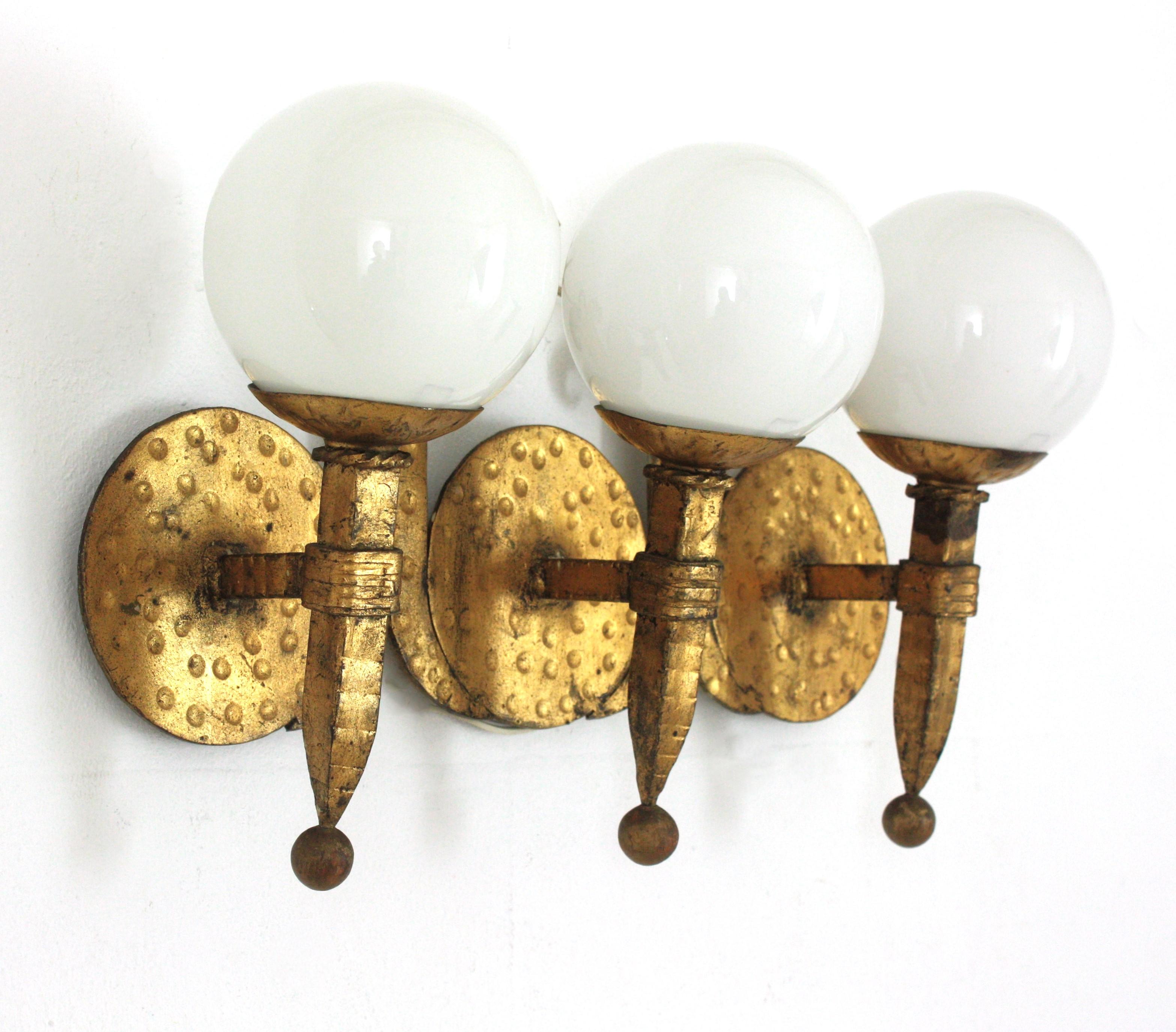 Spanish Torch Wall Light in Gilt Iron with Milk Glass Globes, Spain 1940s For Sale