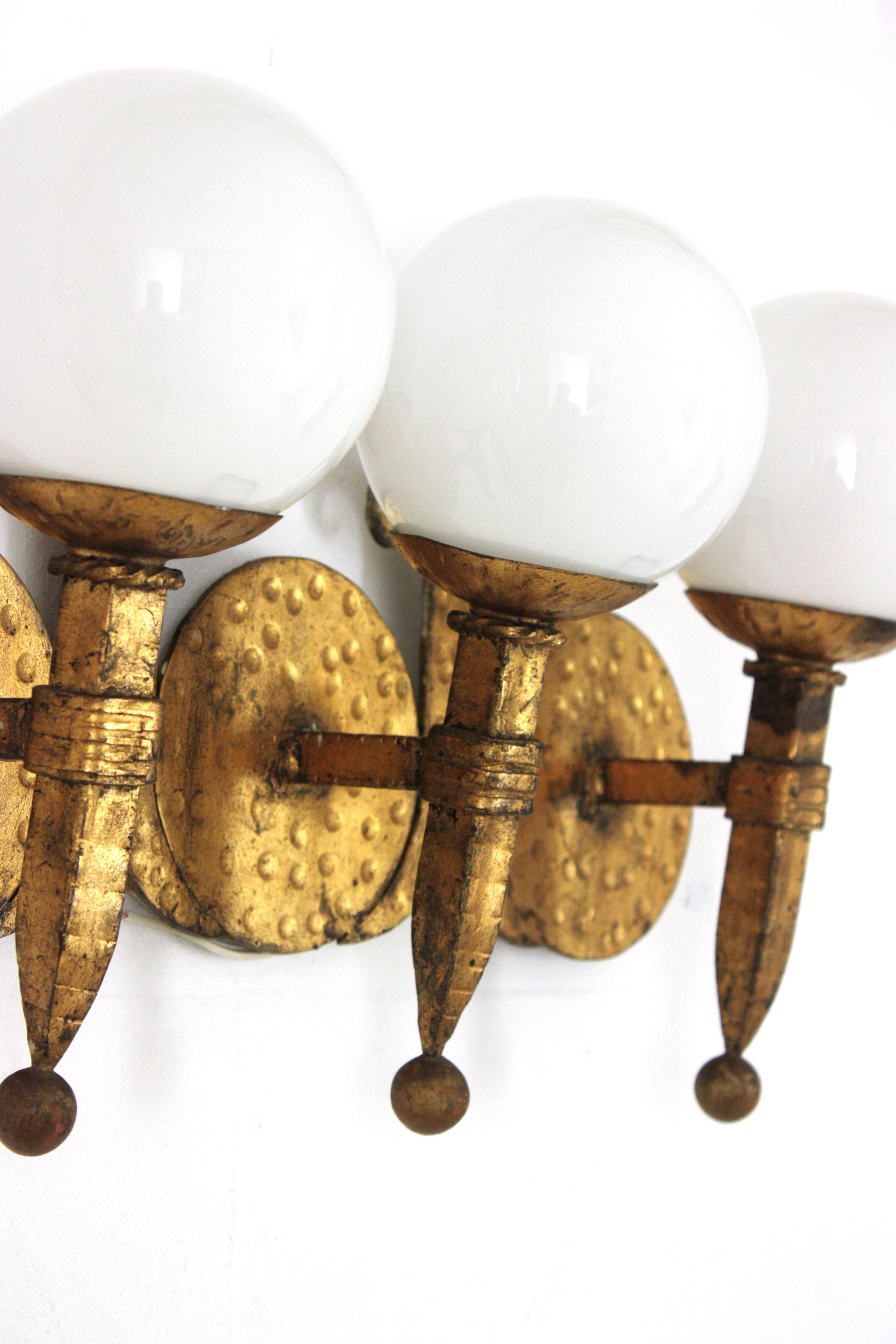 20th Century Torch Wall Light in Gilt Iron with Milk Glass Globes, Spain 1940s For Sale