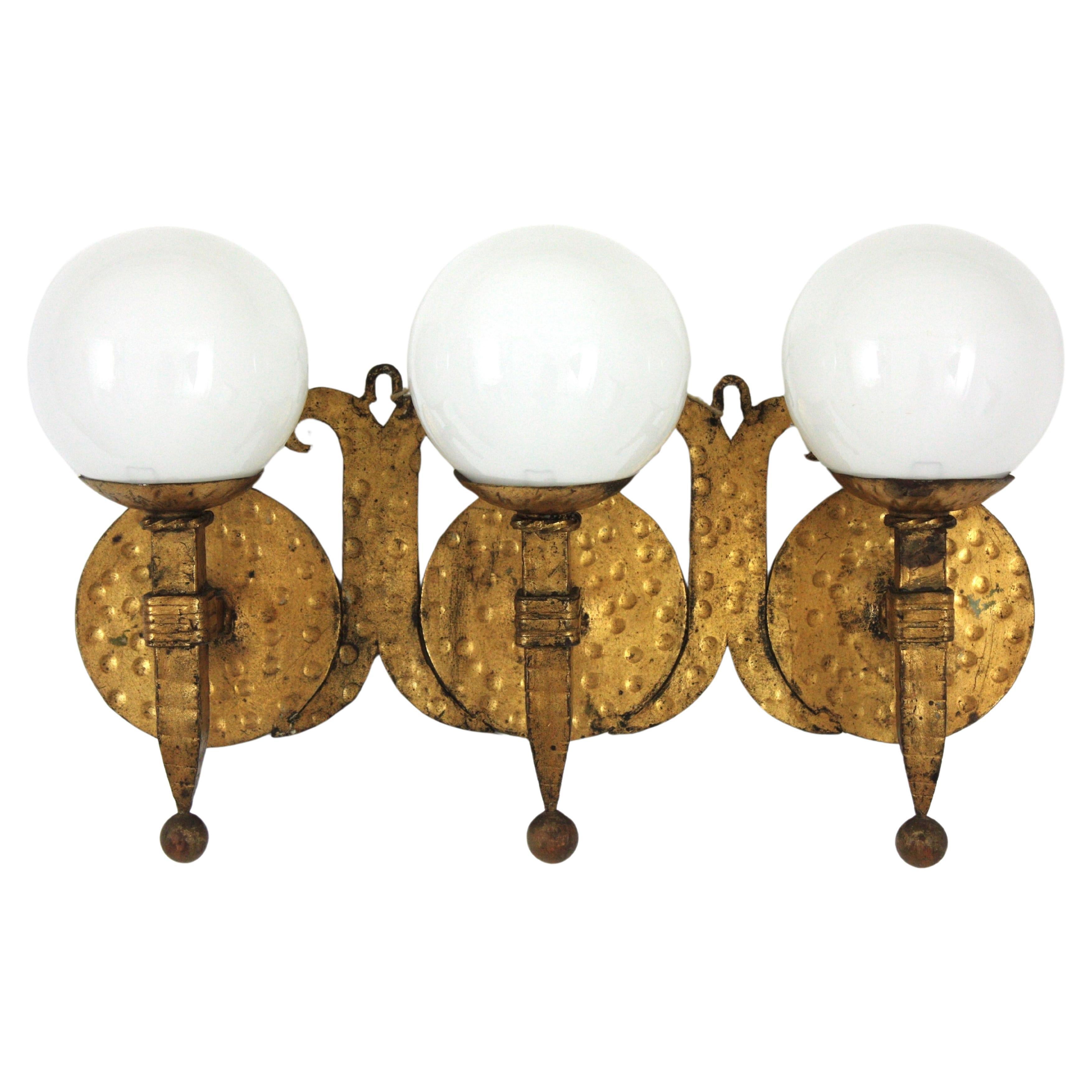 Spanish Revival Gilt Iron Torch Wall Light with Three Milk Glass Globes