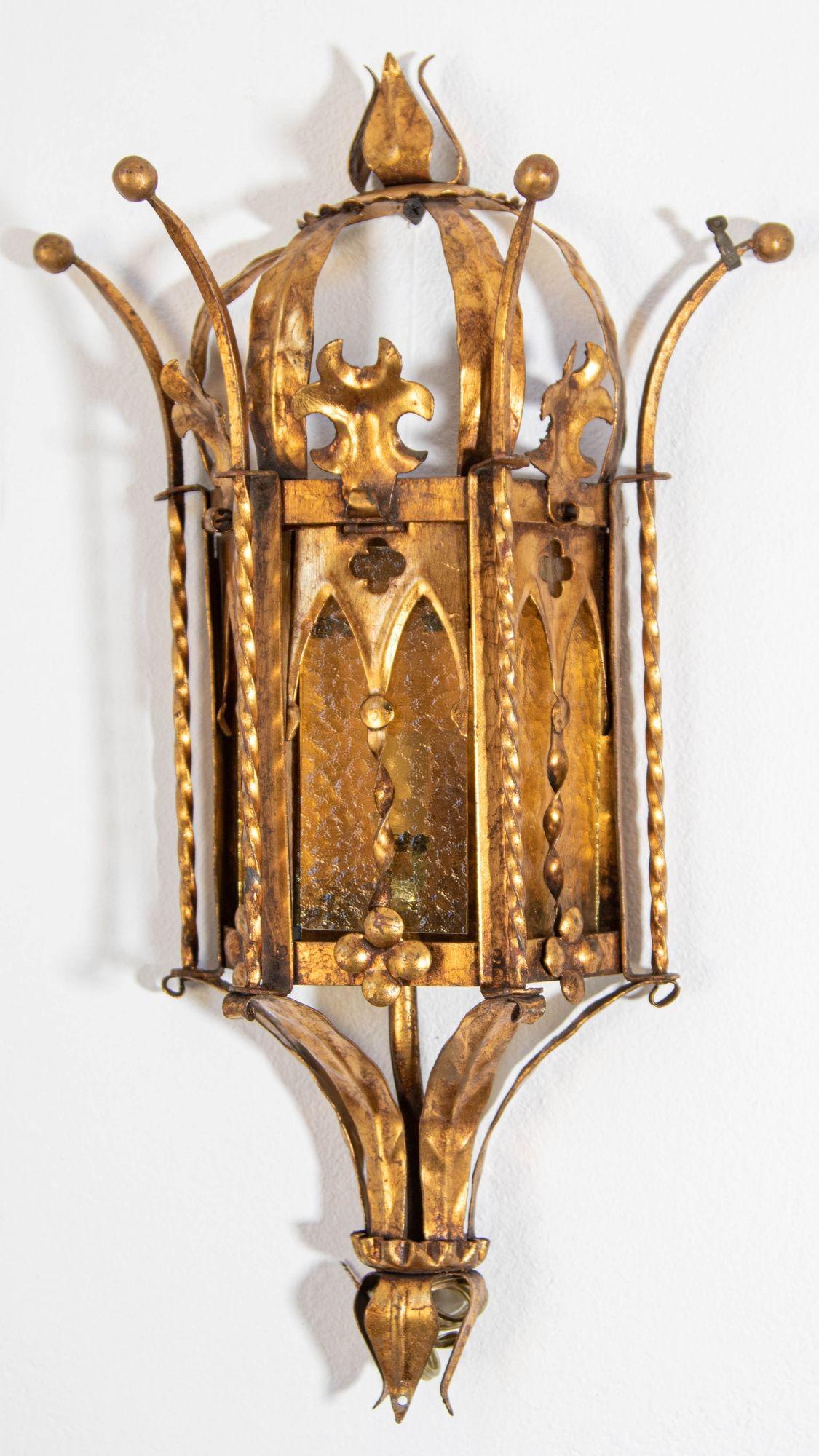 Spanish Colonial Spanish Revival Gothic Hand Forged Metal Gilt Wall Sconces a Pair circa 1950s For Sale