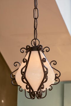 Spanish Revival Style Pendant with Milk Glass Globe