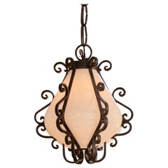 Spanish Revival Style Pendant with Milk Glass Globe