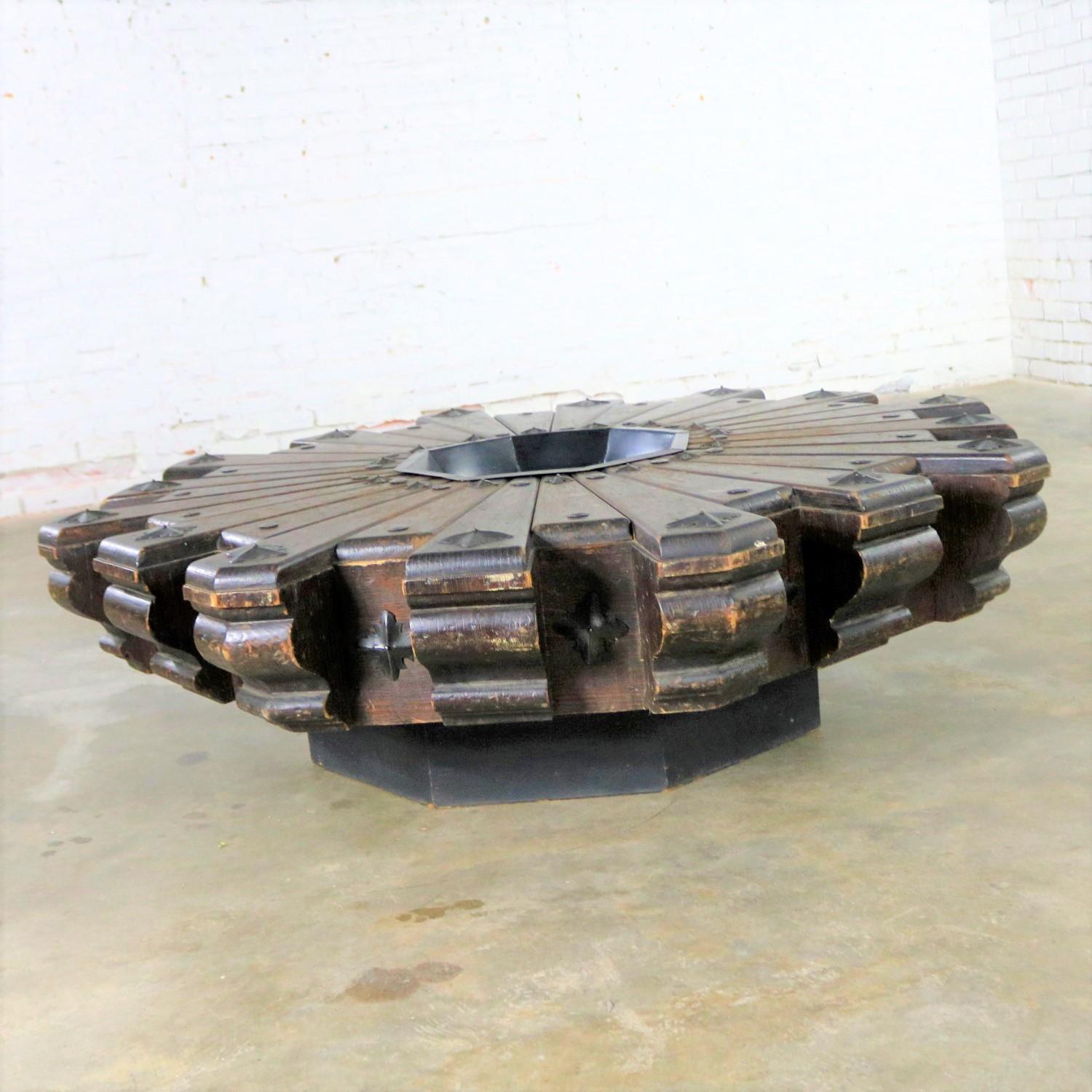 Amazing Spanish Revival style extra-large octagon pinwheel coffee table with a centre metal pan for fire pit cooking, plant or decor. This table is attributed to Artes De Mexico Internacionales, SA and retains a partial tag which looks much like the