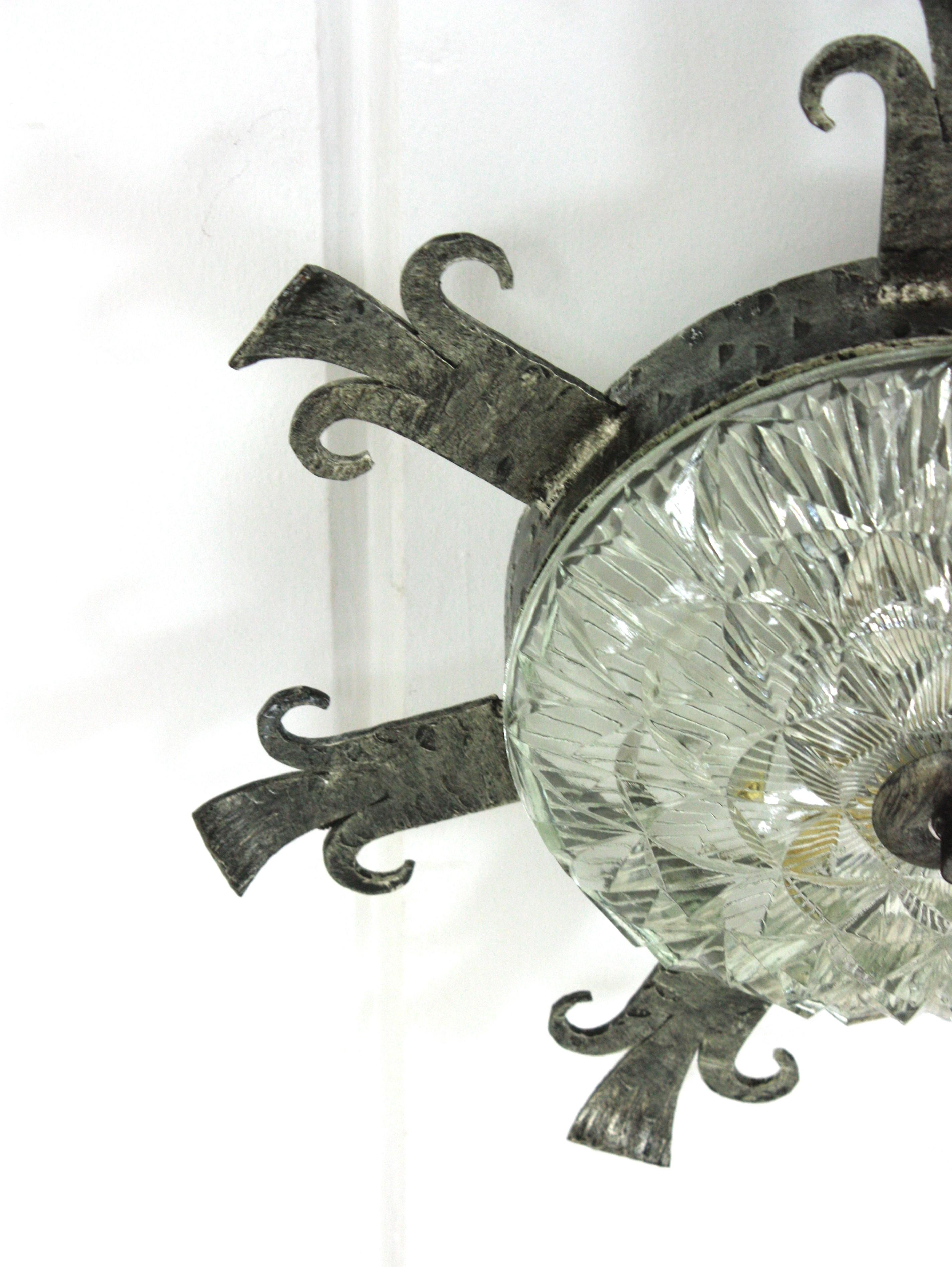 20th Century 1940s Spanish Revival Sunburst Ceiling Light Fixture in Wrought Iron and Glass For Sale