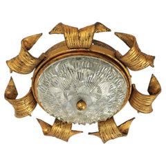 Spanish Revival Sunburst Light Fixture in Gilt Wrought Iron and Glass, 1940s