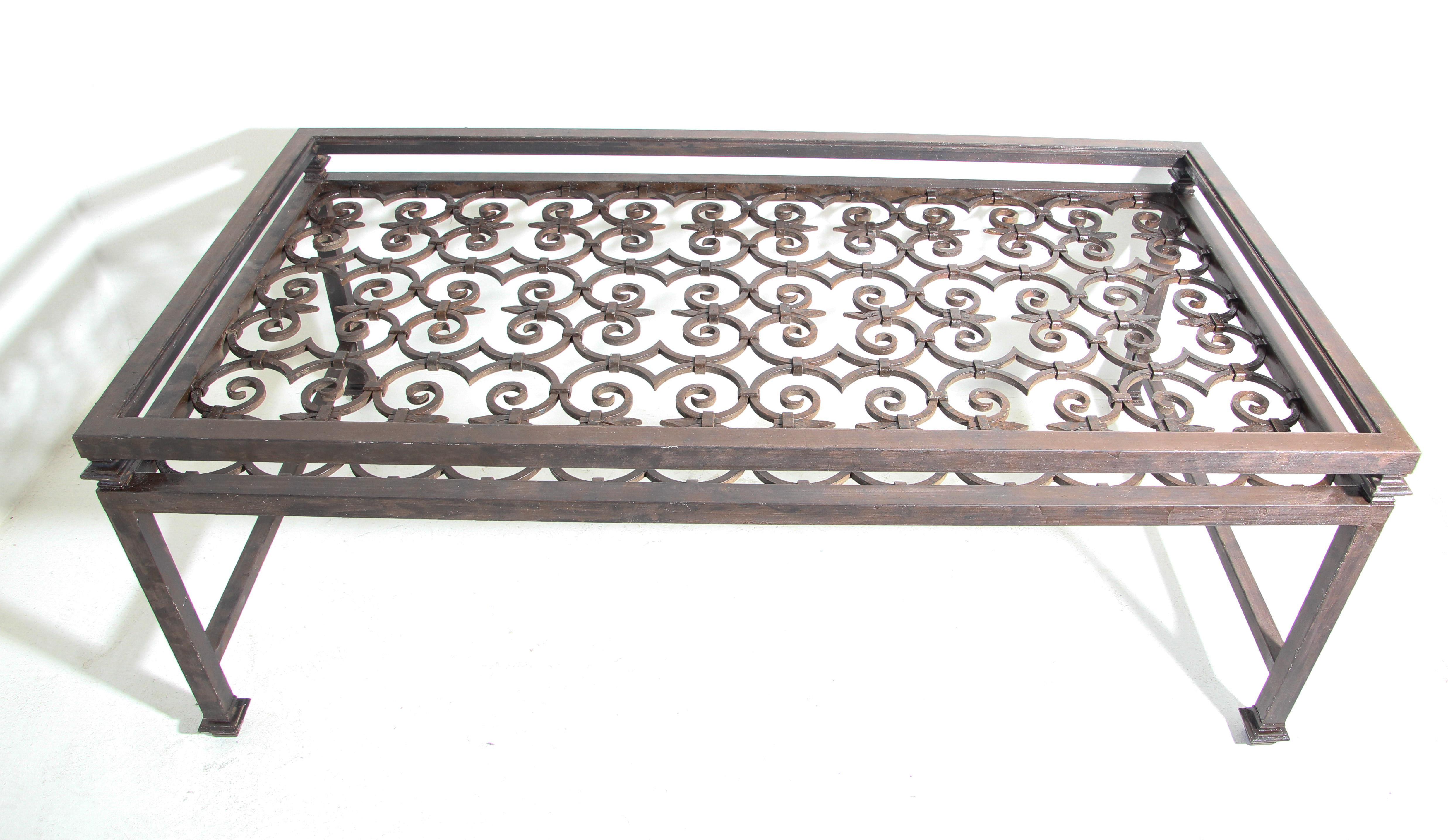 Impressive large Spanish Revival wrought Iron coffee table base with the typical Moorish design construction.
Made from an antique reclaimed window screen into a coffee table.
Stunning Moorish Spanish revival iron coffee table base only, no glass