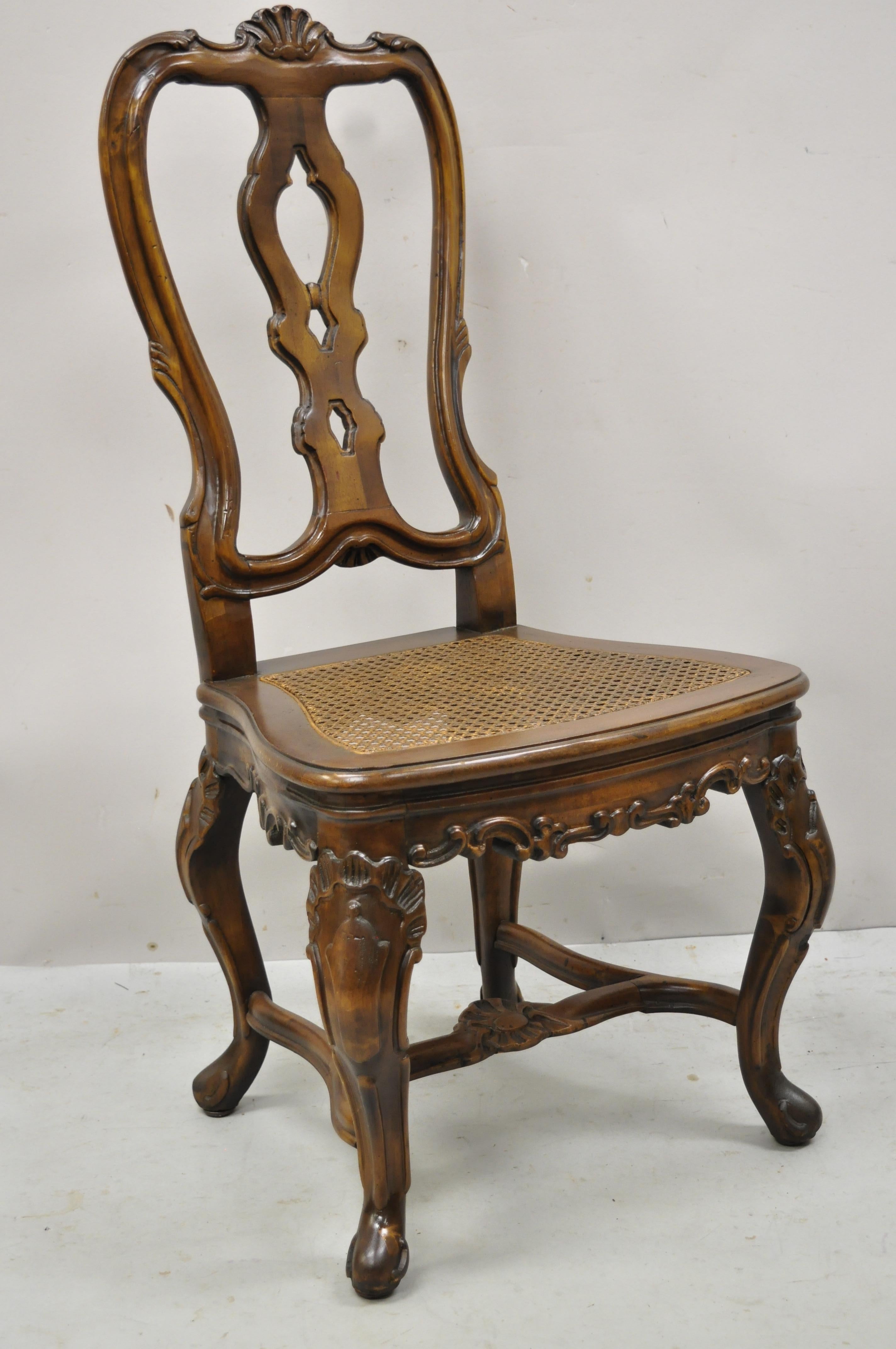 Spanish Rococo Baroque style solid pine wood cane seat dining chairs - Set of 4. Item features (4) side chairs, cane seats, solid wood frame, beautiful wood grain, nicely carved details, cabriole legs, very nice set, quality craftsmanship, great