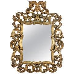 Spanish Rococo Giltwood Mirror with Scrollwork Frame and Crest