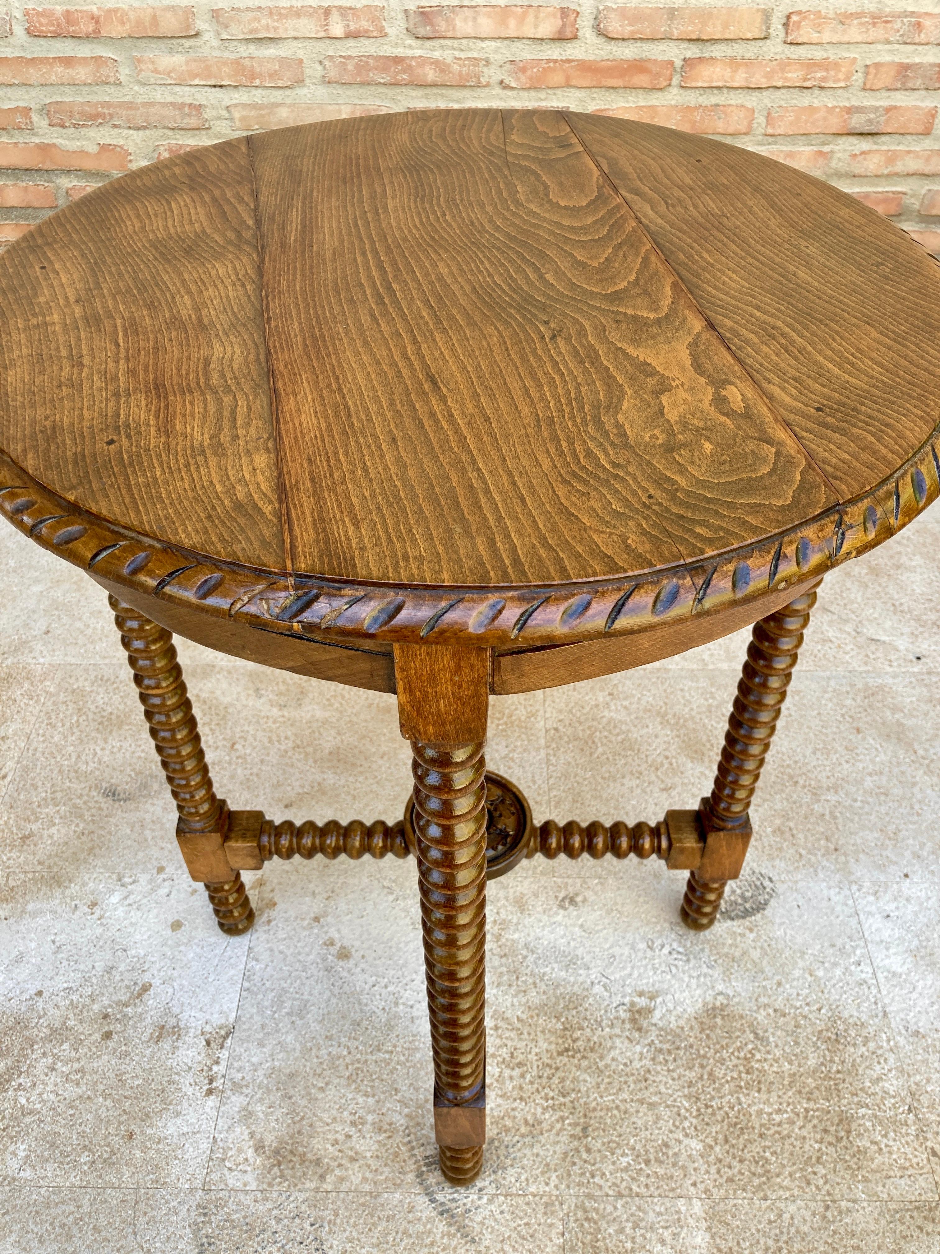 Baroque Spanish Round Walnut Side Table With Turned Legs And Beleveled Edges 1900s