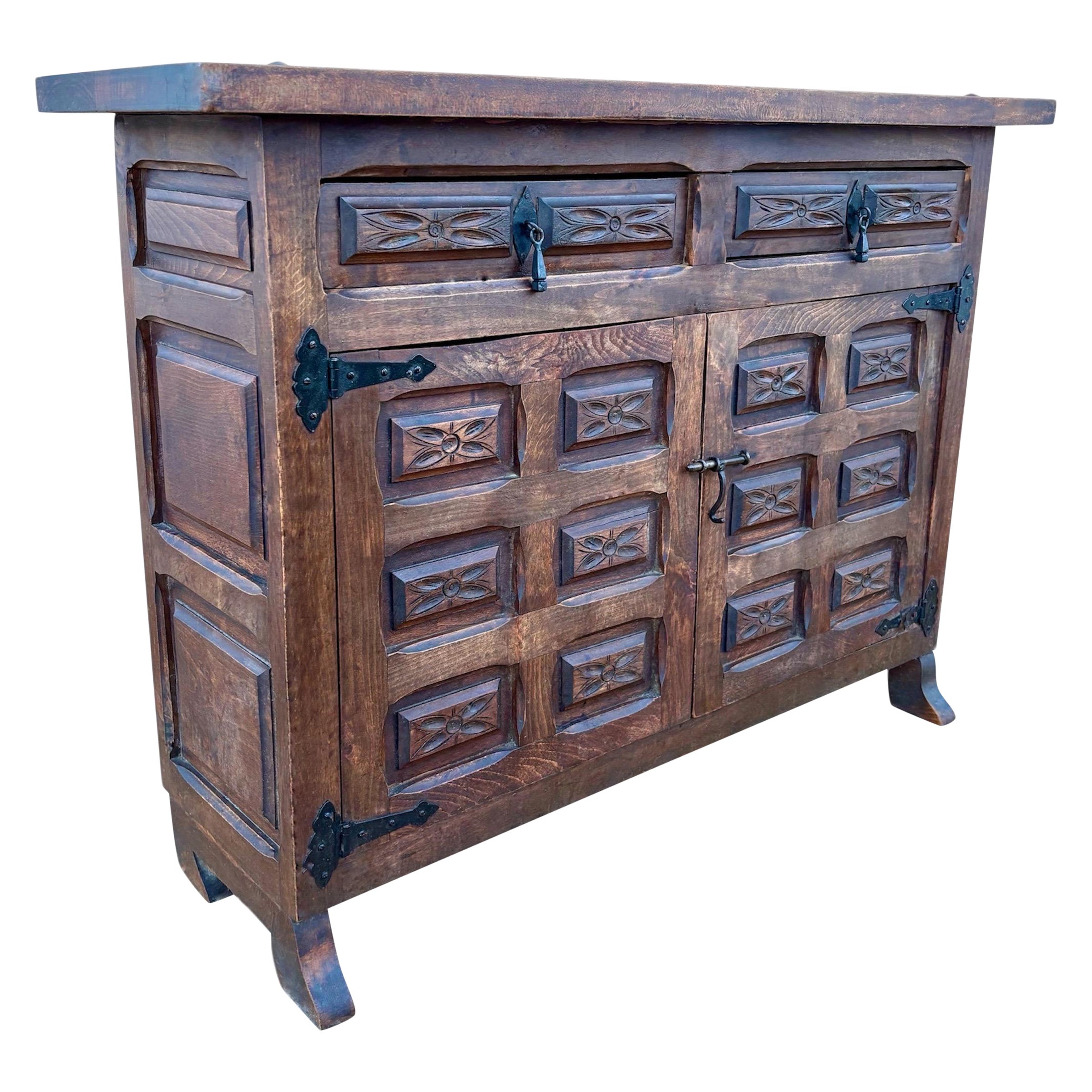 Spanish Rustic Carved Solid Wood Sideboard with Wrought Iron Details For Sale