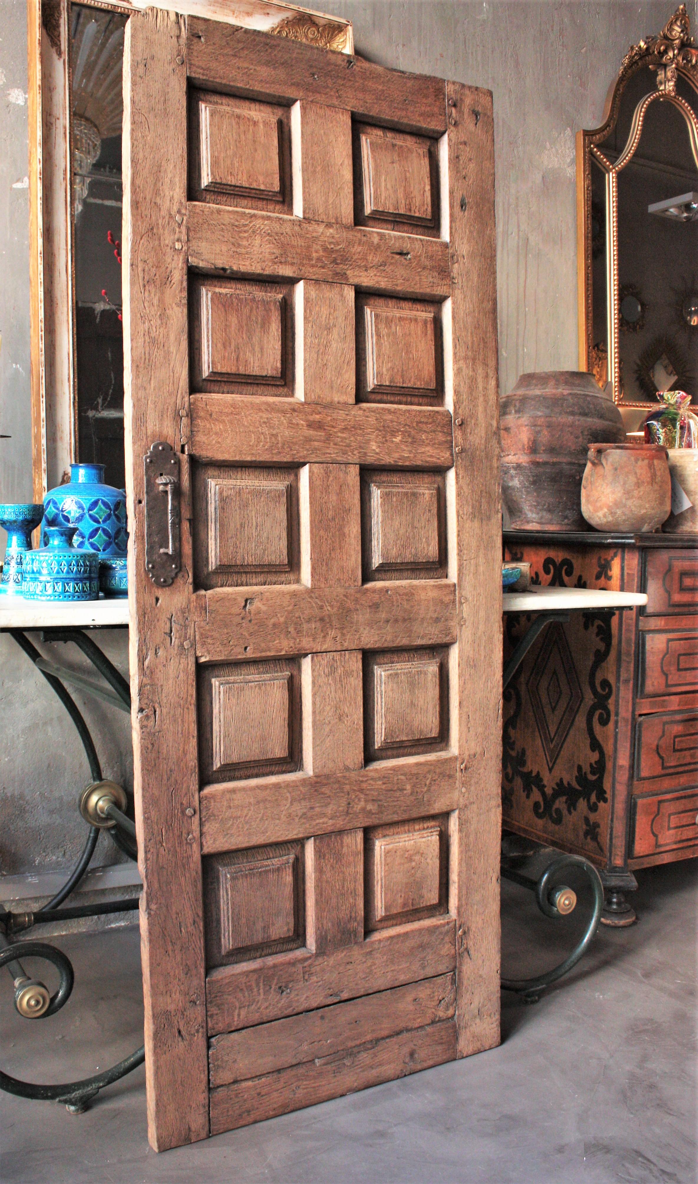 Spanish Rustic Door with Original Hand Forged Iron Pull In Good Condition For Sale In Barcelona, ES