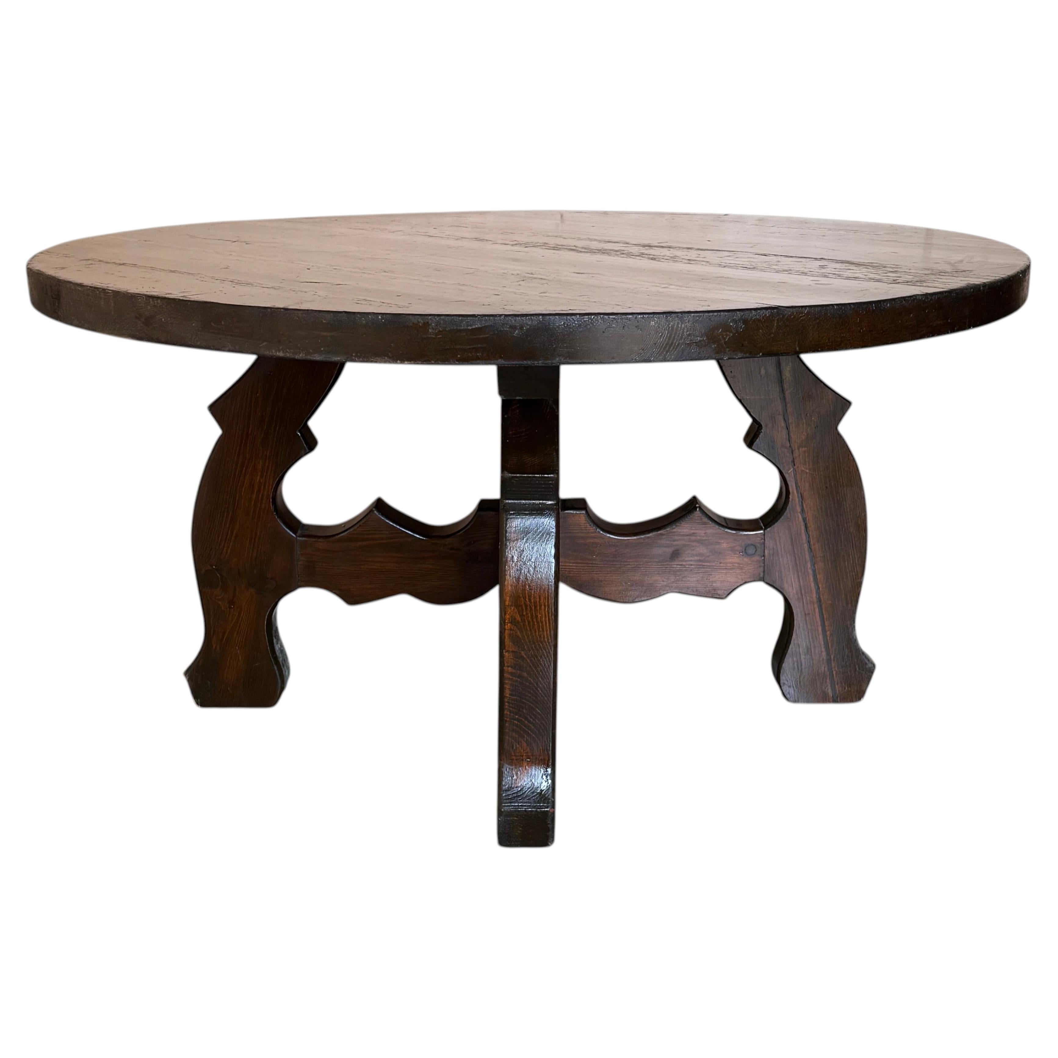 Spanish Rustic Walnut Round Coffee Table with Carved Lyre Trestle Base, 1940s