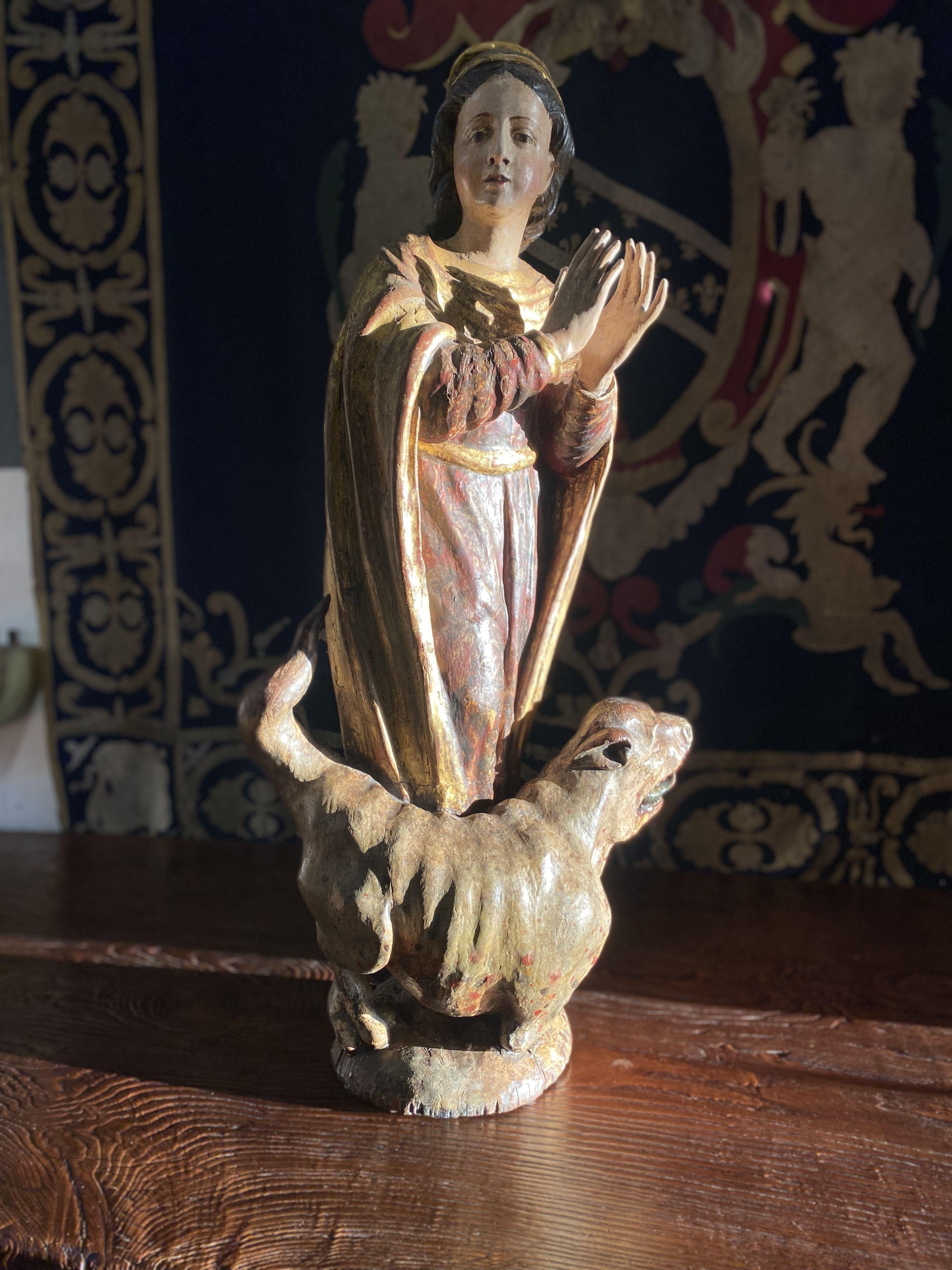 Hand-Carved Late 17th Century Carved Spanish Sculpture of Saint Margaret and Medieval Dragon For Sale