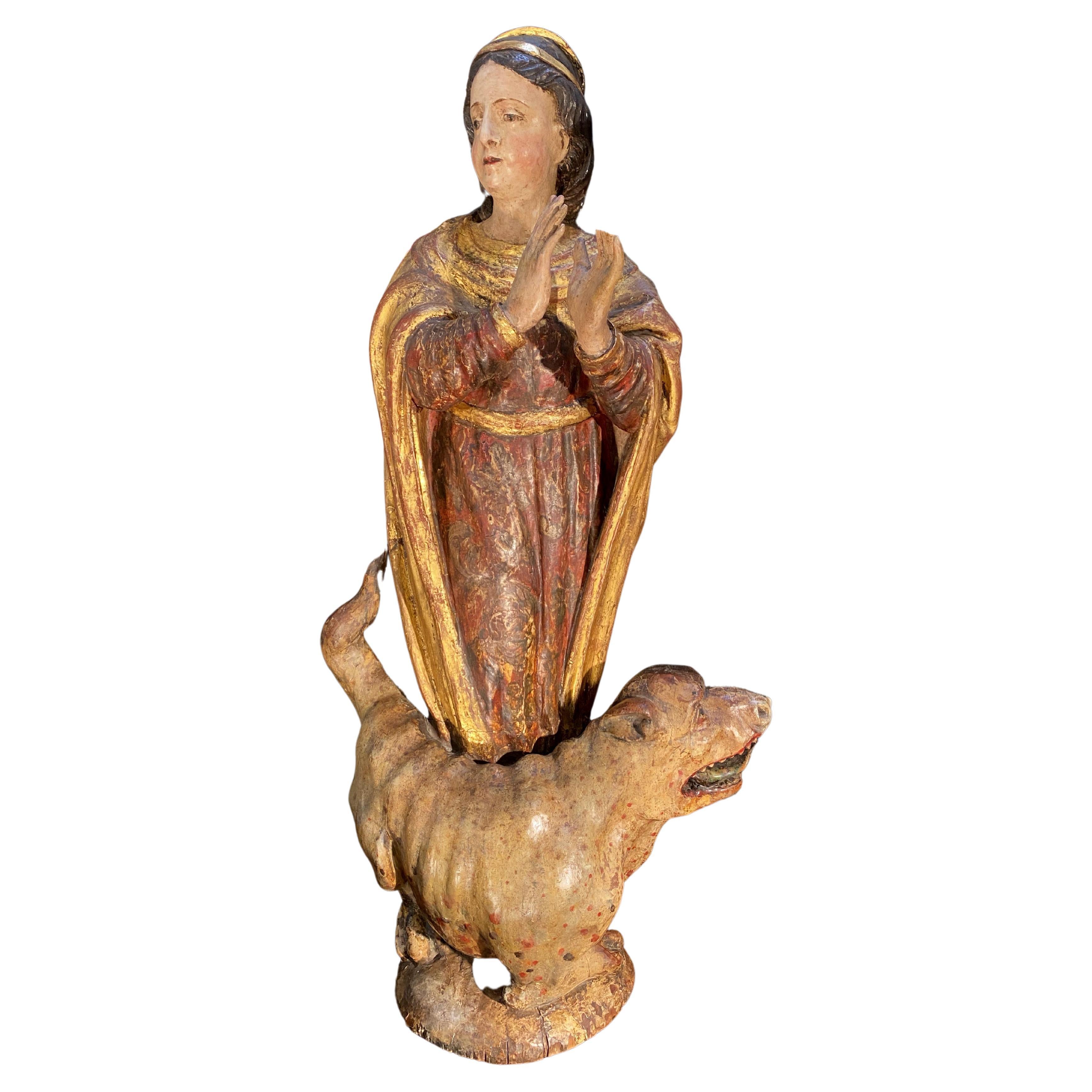 Geschnitzte spanische Skulptur der Heiligen Margaret und des mittelalterlichen Drachens aus dem späten 17. Jahrhundert im Angebot