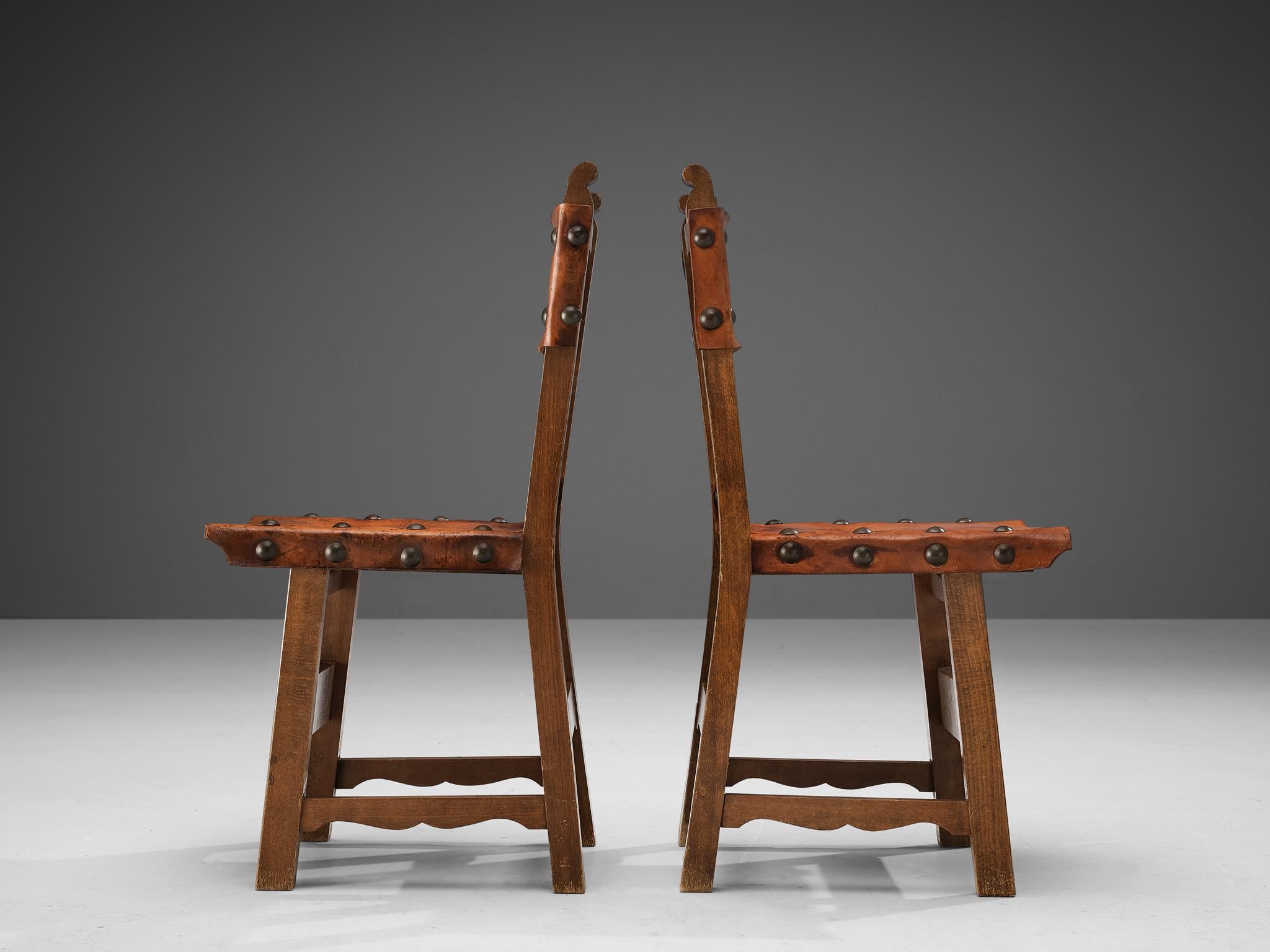 Mid-20th Century Spanish Set of Eight Dining Chairs in Oak and Patinated Cognac Leather
