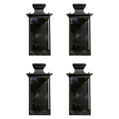 Spanish Set of Four Iron Wall Sconces with Bronze Decorations Spanish Set of Four Iron Wall Sconces with Bronze Decorations
