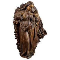 Spanish Shool, Gilded Wooden Relief Sculpture of a Virgin Carrying a Child