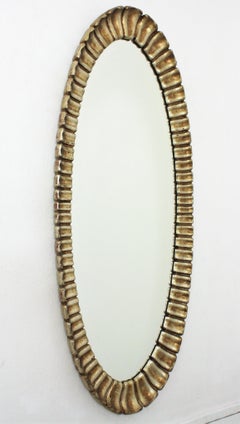 Sunburst Gilt Silver Leaf Carved Wood Oval Mirror by Francisco Hurtado, 1950s