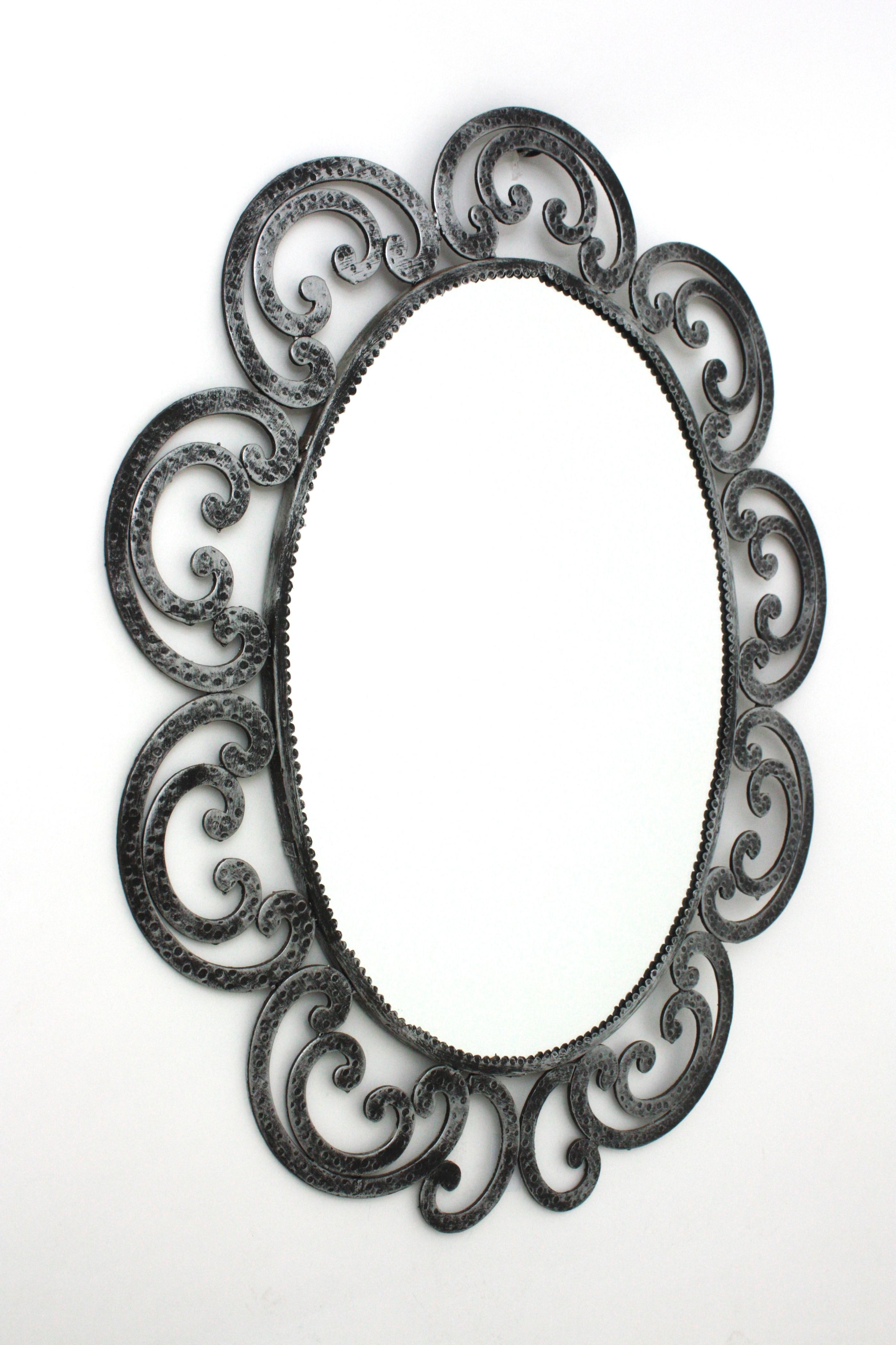 Forged Spanish Silvered Flower Sunburst Oval Mirror in Wrought Iron, 1950s For Sale