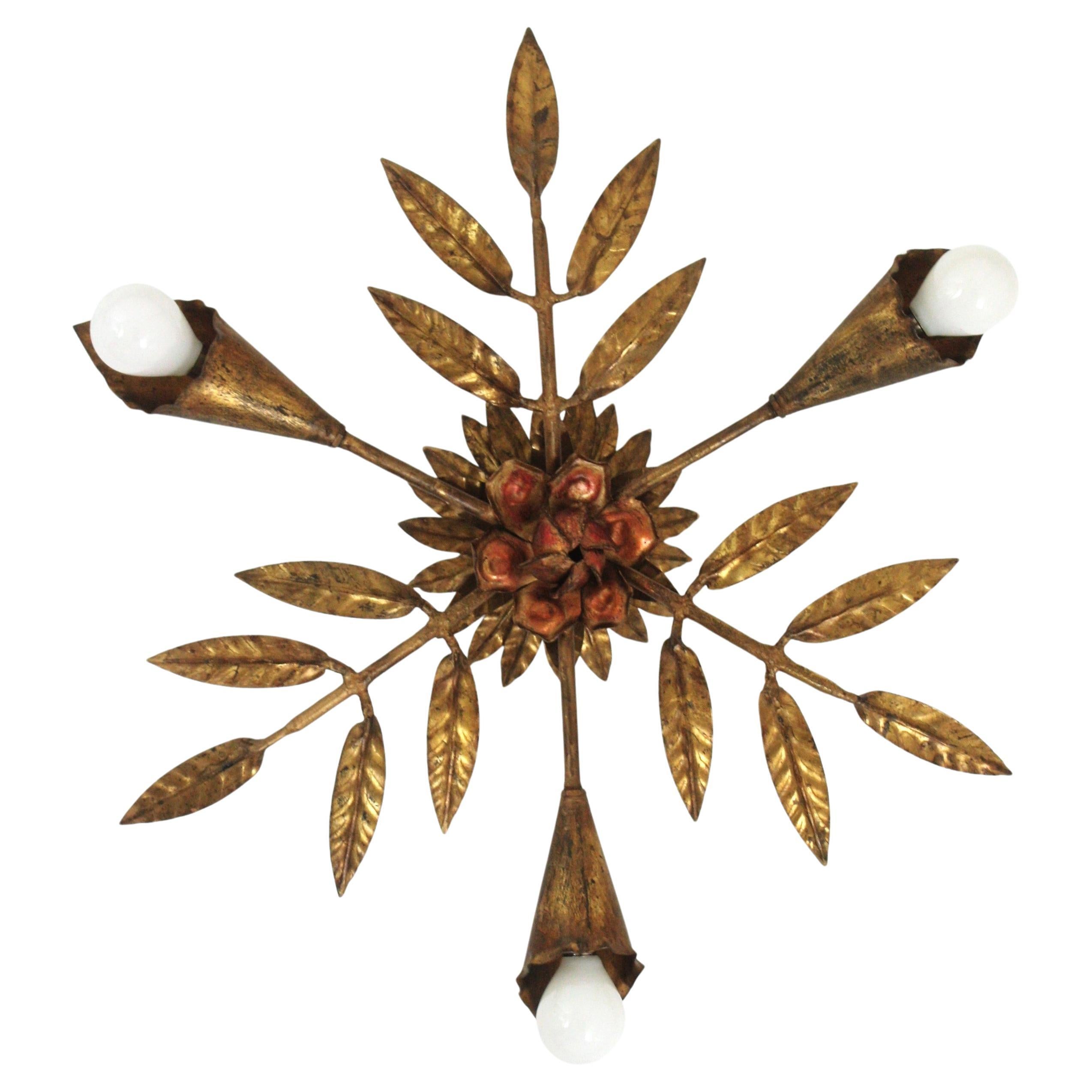 Remarquable plafonnier encastré en fer doré avec feuillage espagnol, Ferro Art, années 1950
A utiliser comme plafonnier ou comme chandelier / suspension en ajoutant une chaîne à la hauteur souhaitée.
Ce plafonnier à cinq lumières présente un