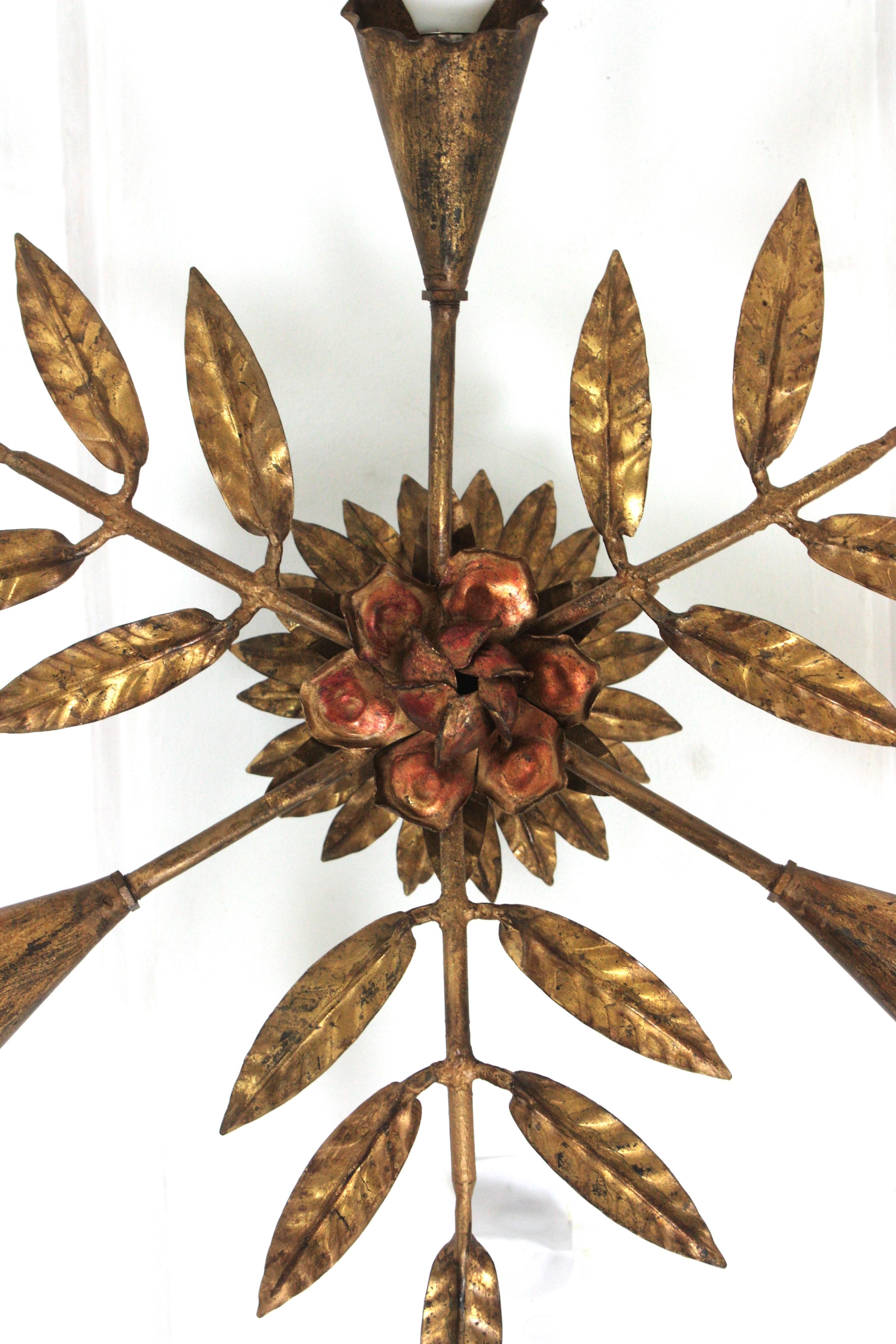 Doré Spanish Starburst Sunburst Foliage Flush Mount Light Fixture in Gilt Iron (en fer doré) en vente