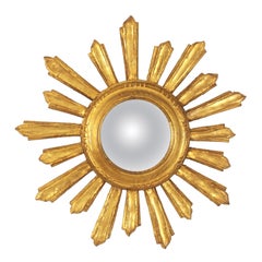 Miroir espagnol en forme d'étoile en bois doré sculpté, années 1950