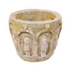 Antique Spanish Stone Planter Adorned with Figures and Archways, Early 20th Century