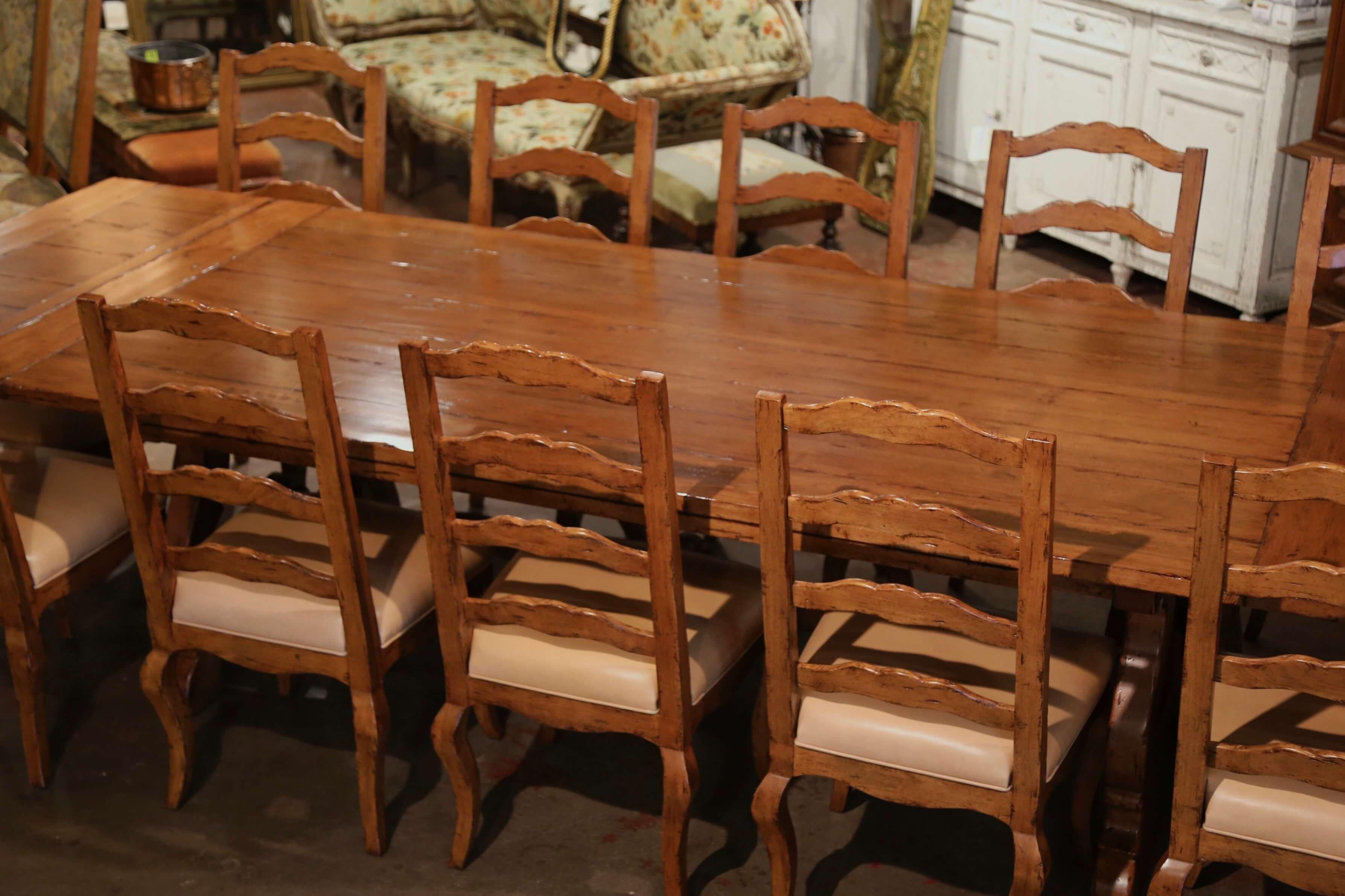Louis XIII Spanish Style Carved Walnut Refectory Trestle Dining Table and 12 Leather Chairs