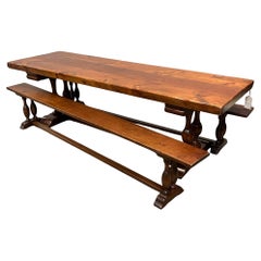 Spanish style cherry trestle table with pair of matching benches