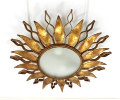Spanish Sunburst Ceiling Light Fixture in Gilt Wrought Iron and Glass, 1950s
