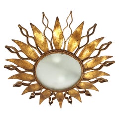 Spanish Sunburst Ceiling Light Fixture in Gilt Wrought Iron and Glass, 1950s