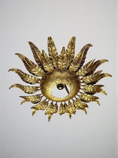 Spanish Sunburst ceiling light fixture or sconce in Gilt Wrought Iron, Circa