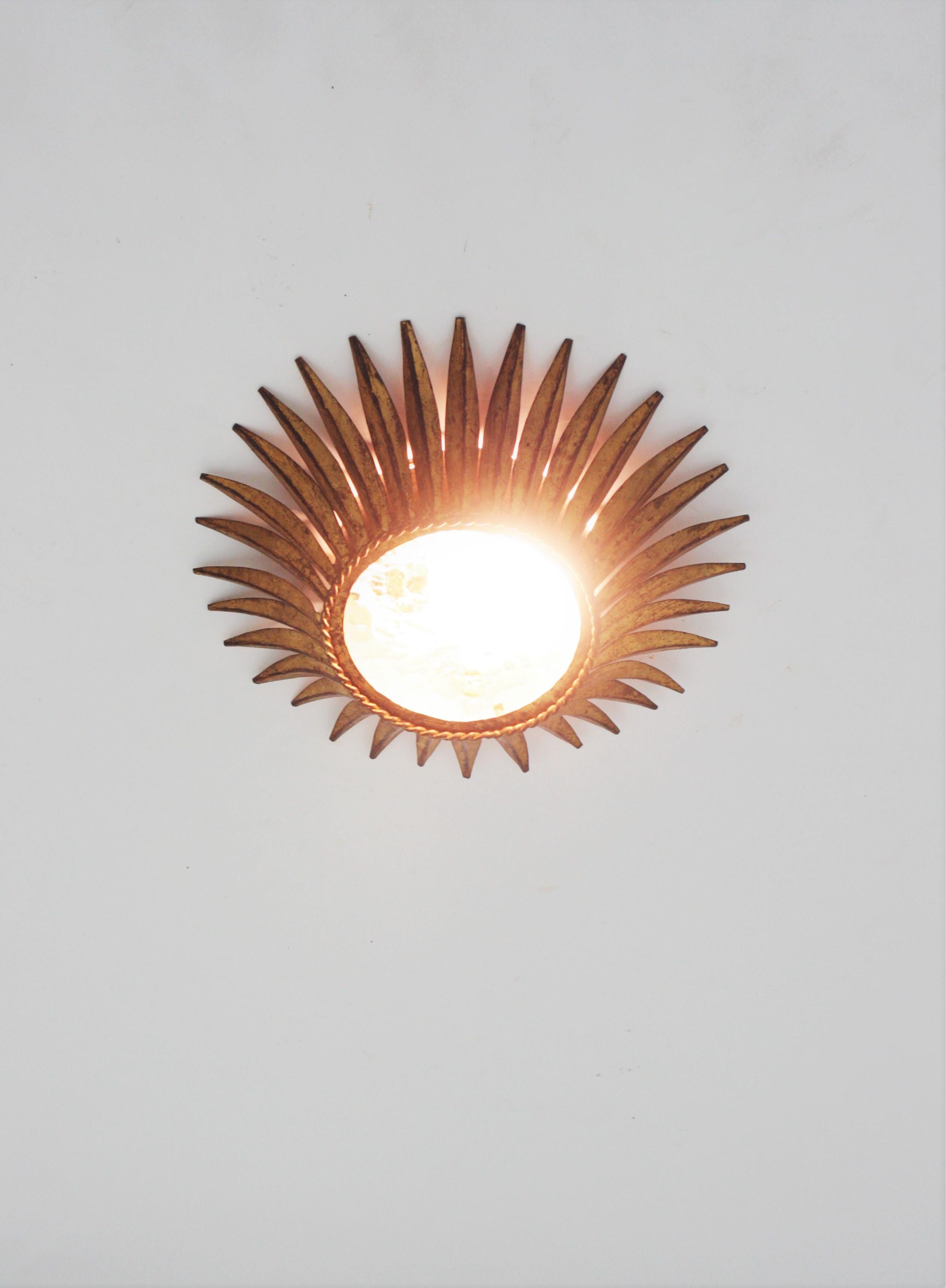 Spanish Sunburst Crown Ceiling Light Fixture, Gilt Iron and Textured Glass For Sale 4