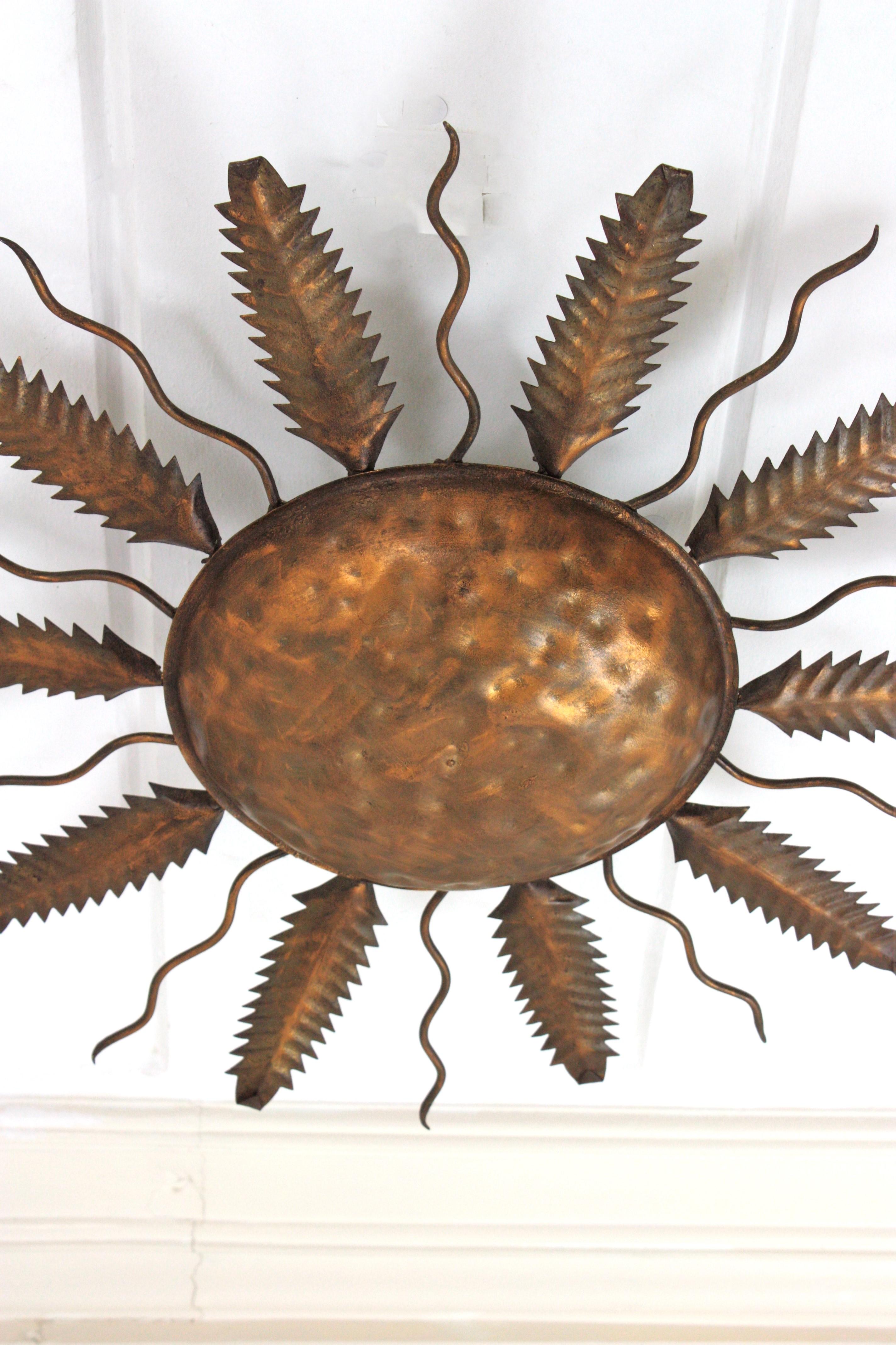 20th Century Spanish Sunburst Flush Mount Ceiling Light Fixture in Gilt Iron For Sale