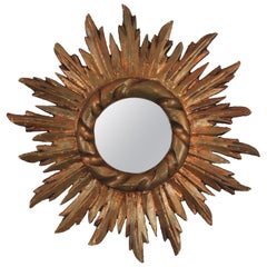 Specchio spagnolo in legno dorato a raggiera in stile barocco, dimensioni ridotte