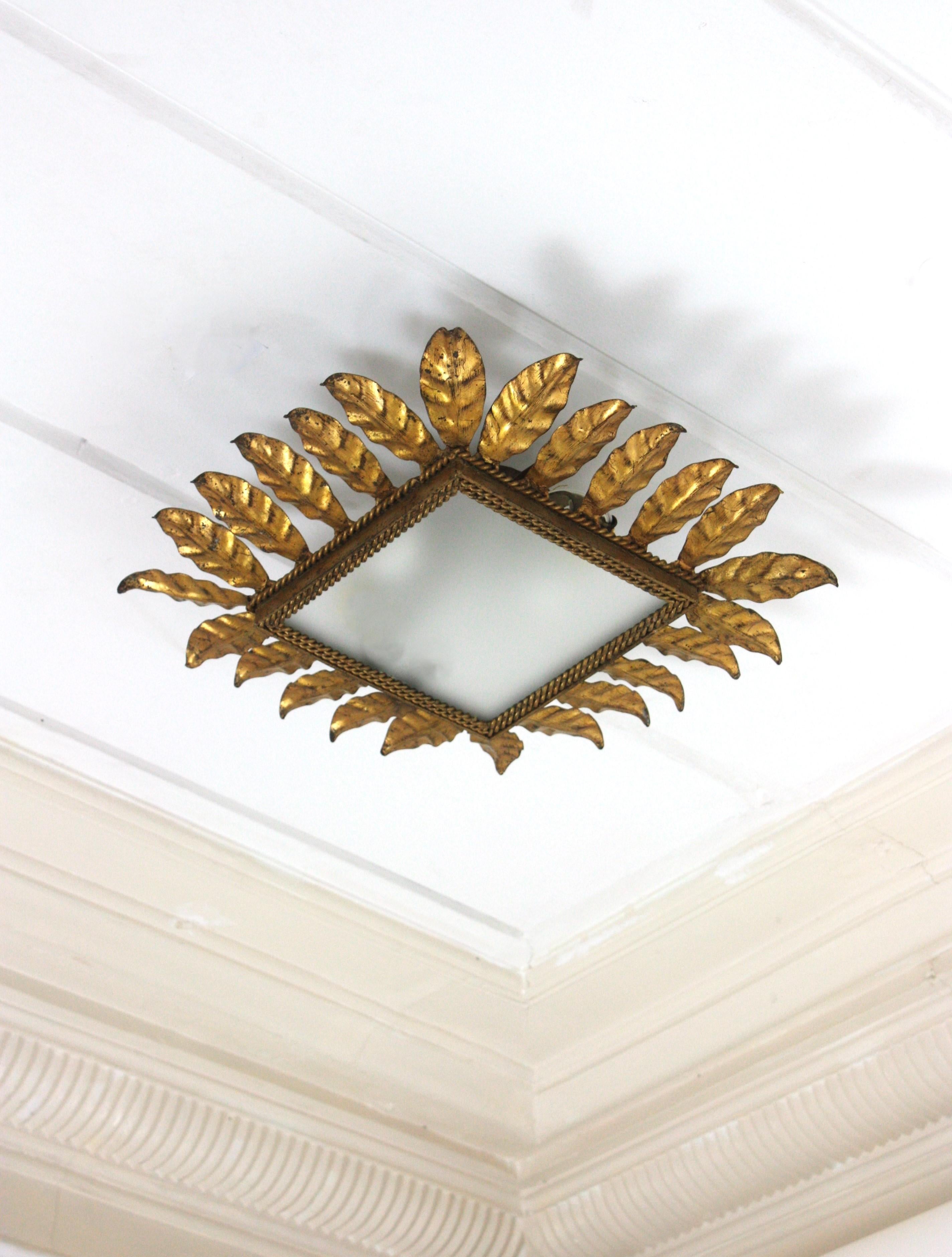 Hollywood Regency Spanish Sunburst Leafed Crown Ceiling Light Fixture, Gilt Iron and Frosted Glass For Sale