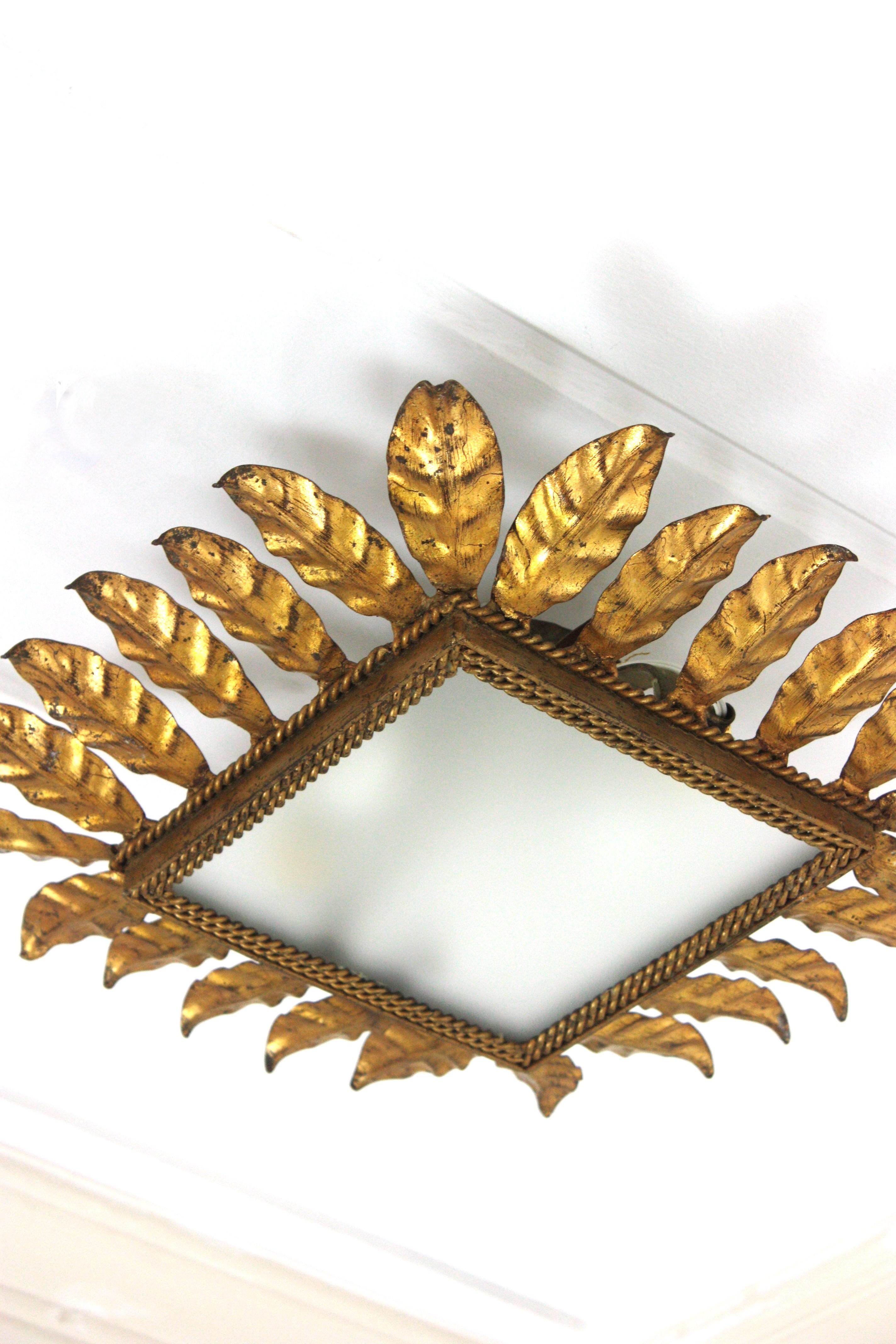 Spanish Sunburst Leafed Crown Ceiling Light Fixture, Gilt Iron and Frosted Glass In Good Condition For Sale In Barcelona, ES