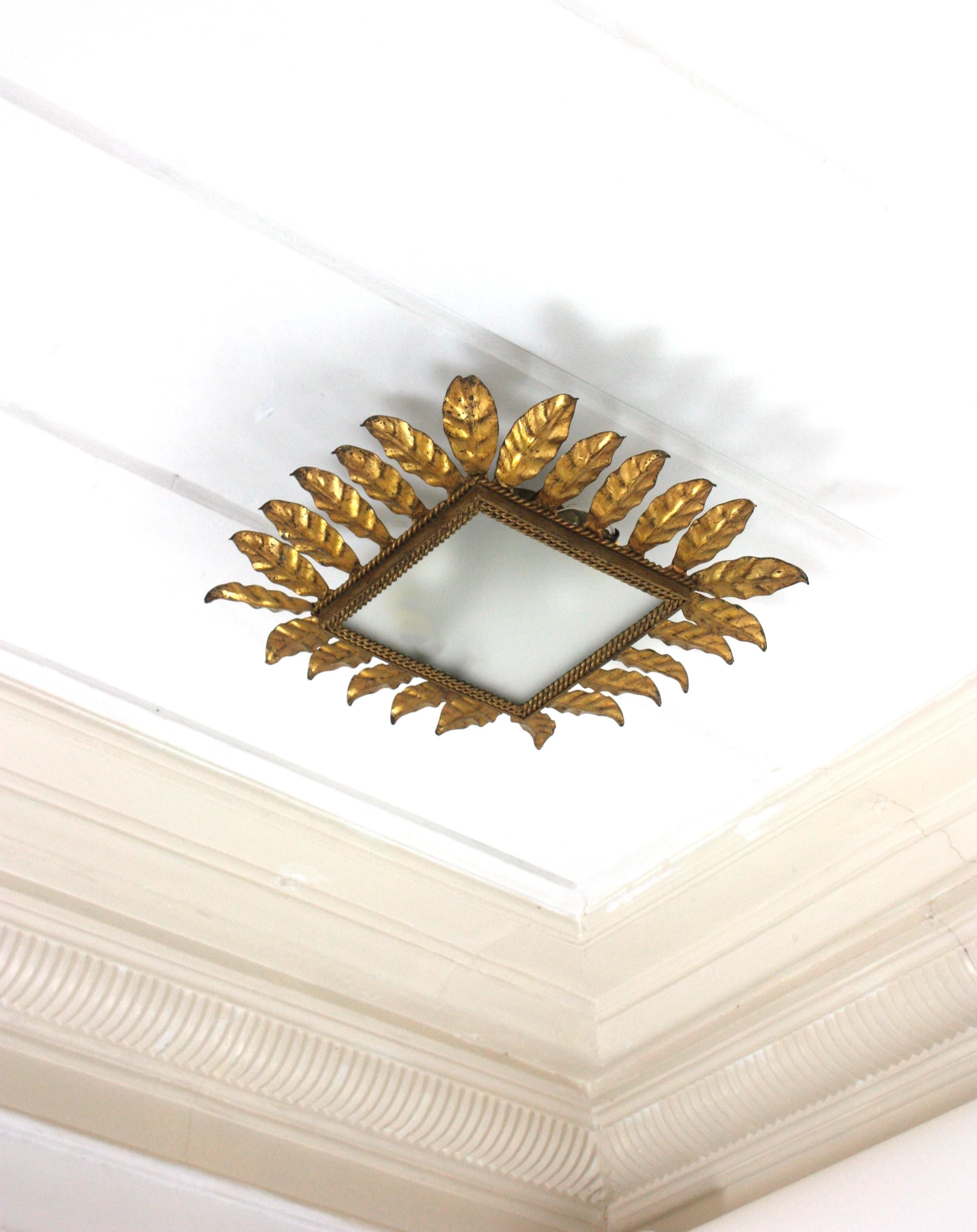 Metal Spanish Sunburst Leafed Crown Ceiling Light Fixture, Gilt Iron and Frosted Glass For Sale