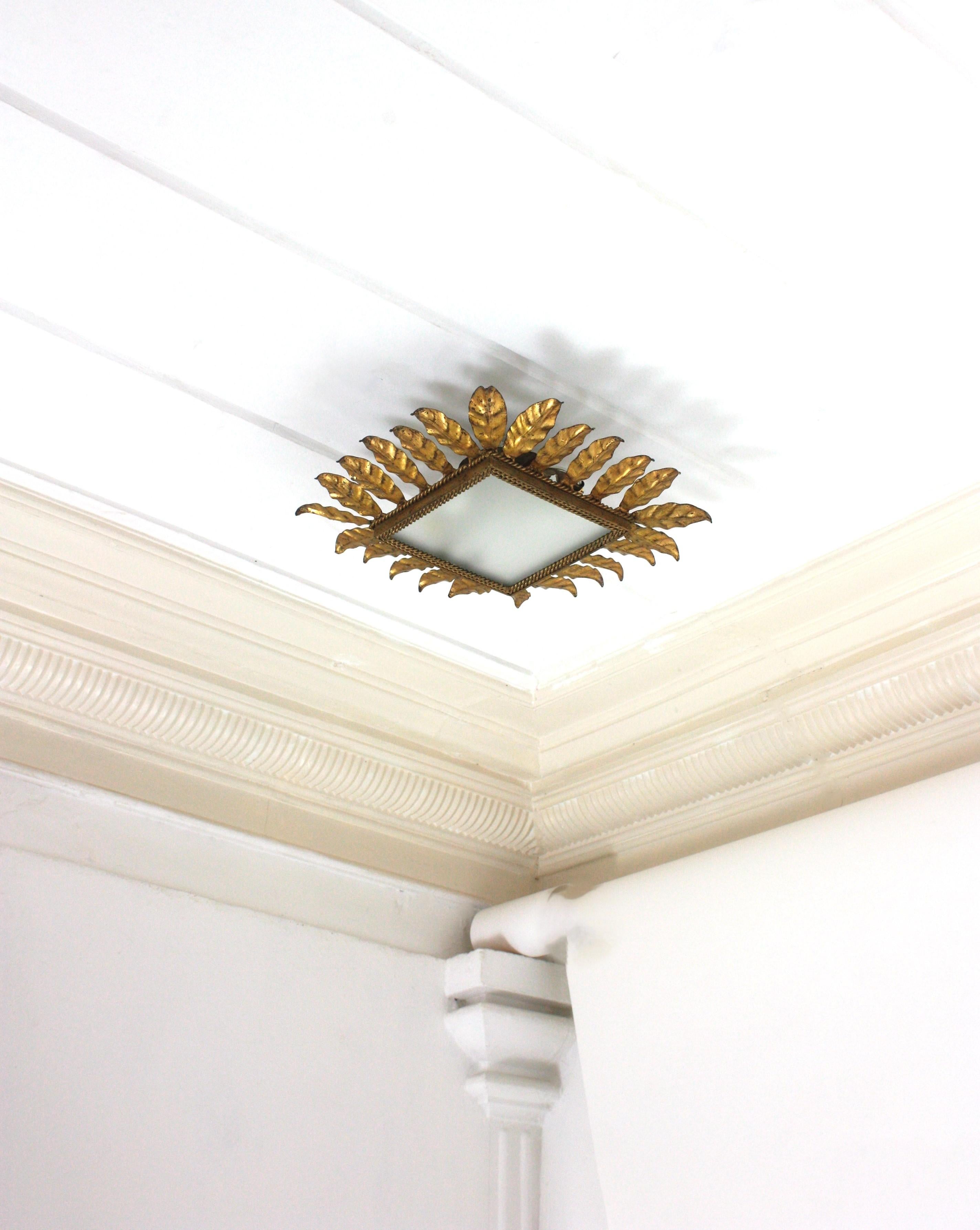 Spanish Sunburst Leafed Crown Ceiling Light Fixture, Gilt Iron and Frosted Glass For Sale 1